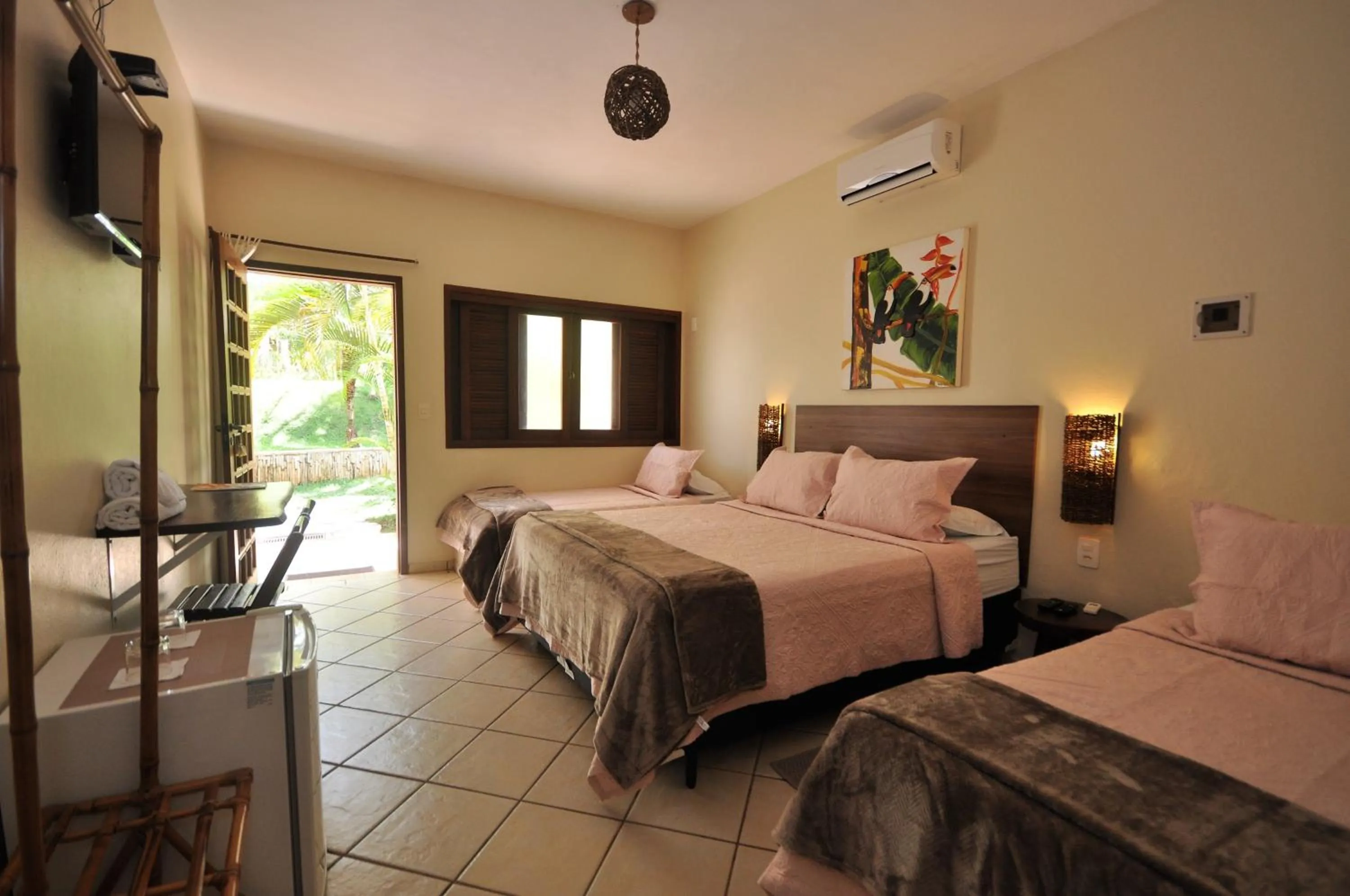 Bed in Pousada Flores do Cerrado