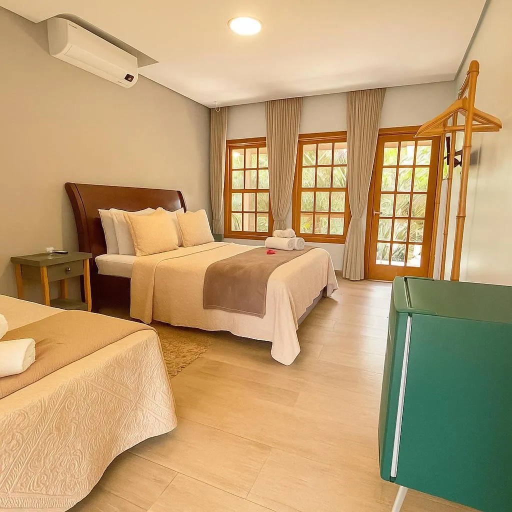 Photo of the whole room, Bed in Pousada Flores do Cerrado