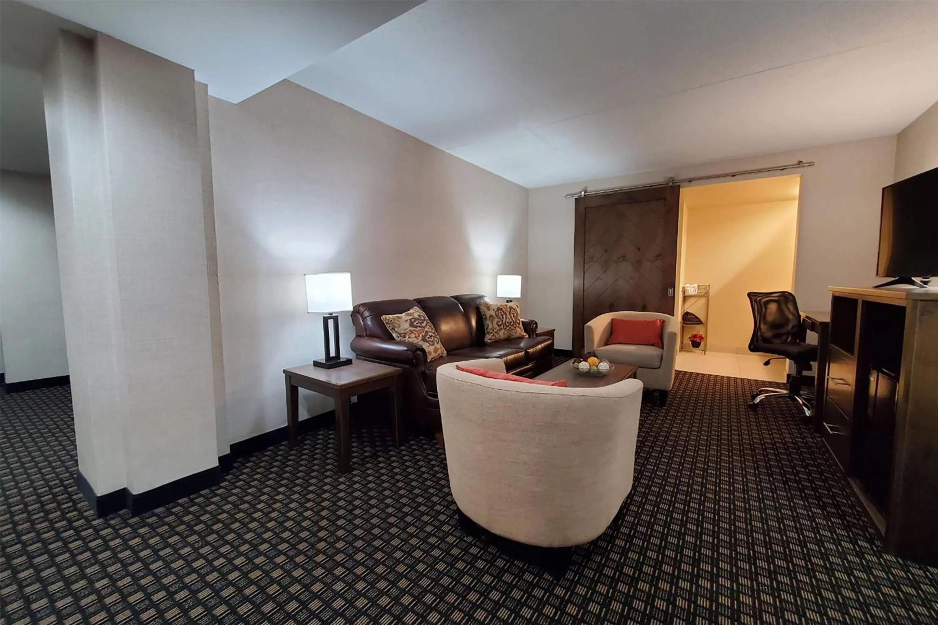 Photo of the whole room in AmericInn by Wyndham Watertown