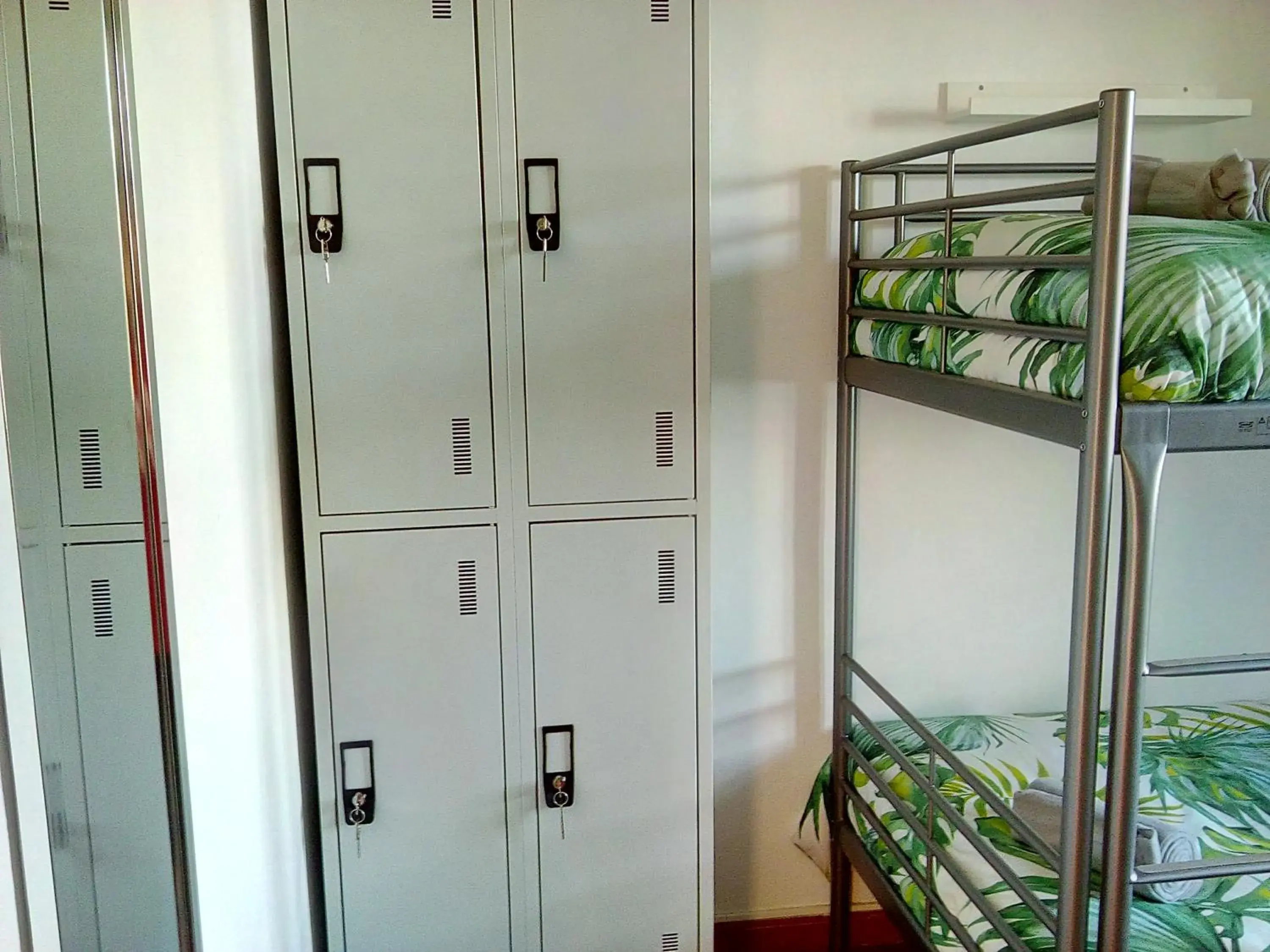 Bed in 4-Bed Mixed Dormitory Room in Fonte da Telha Beach Hostel Bed in 4-Bed Mixed Dormitory Room in Fonte da Telha Beach Hostel