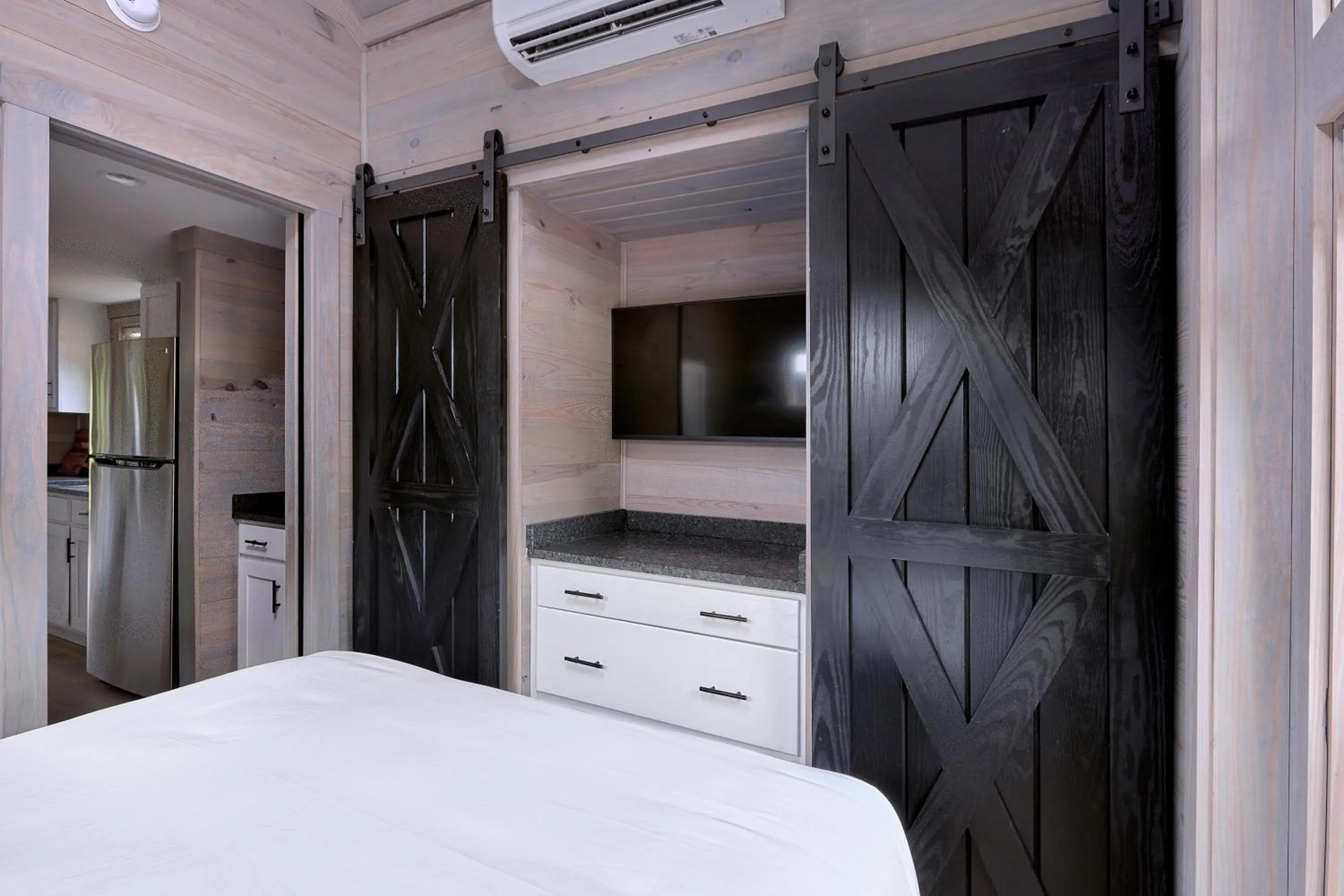 Bed in Asheville River Cabins