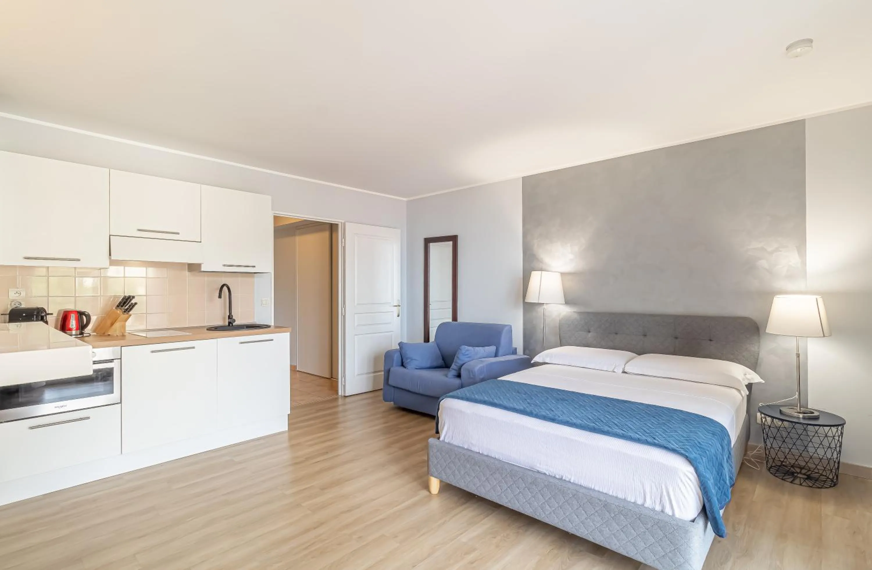 Bed in AppartHotel Jardins d’Elisa