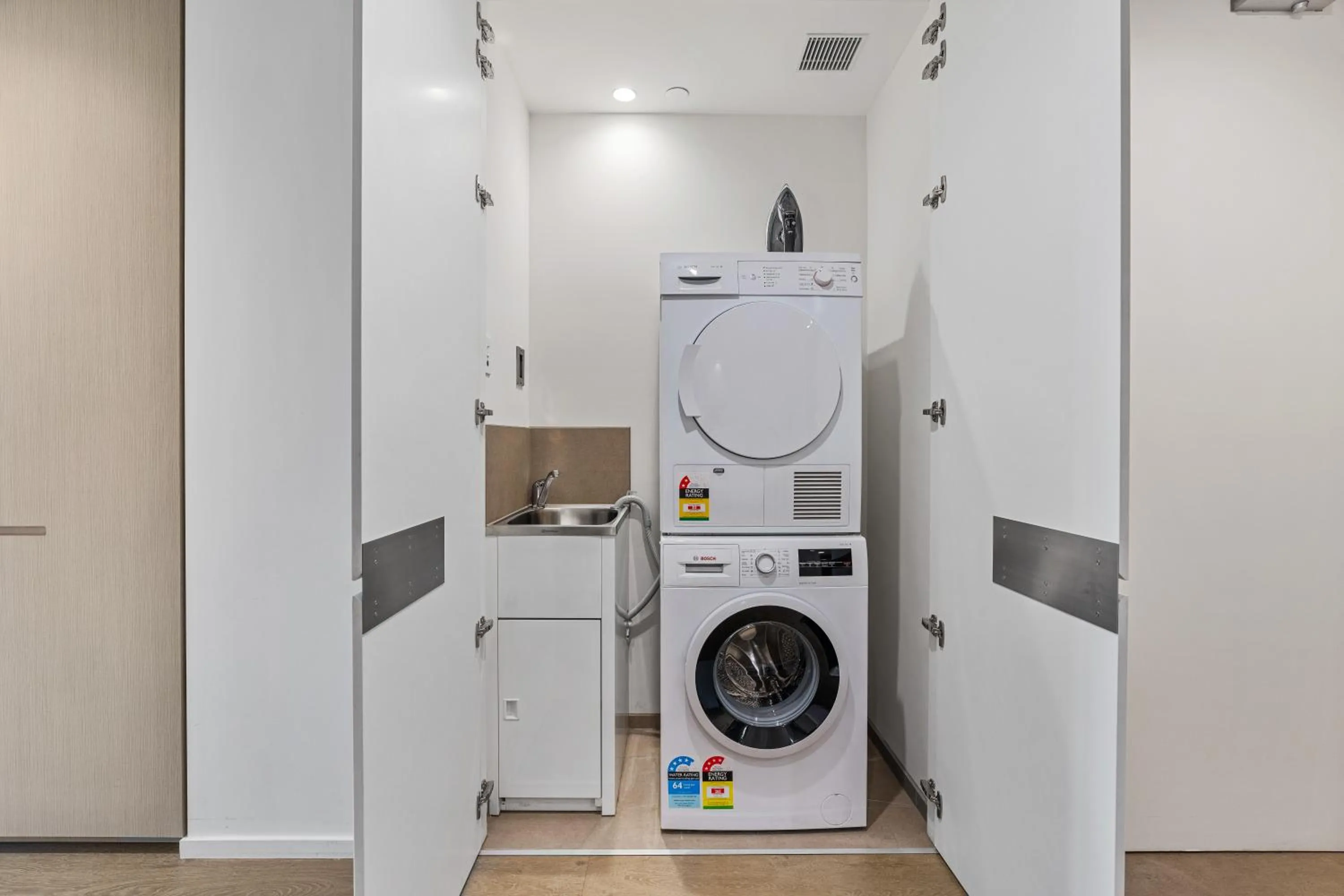washing machine in CLLIX Australia 108 Apartments