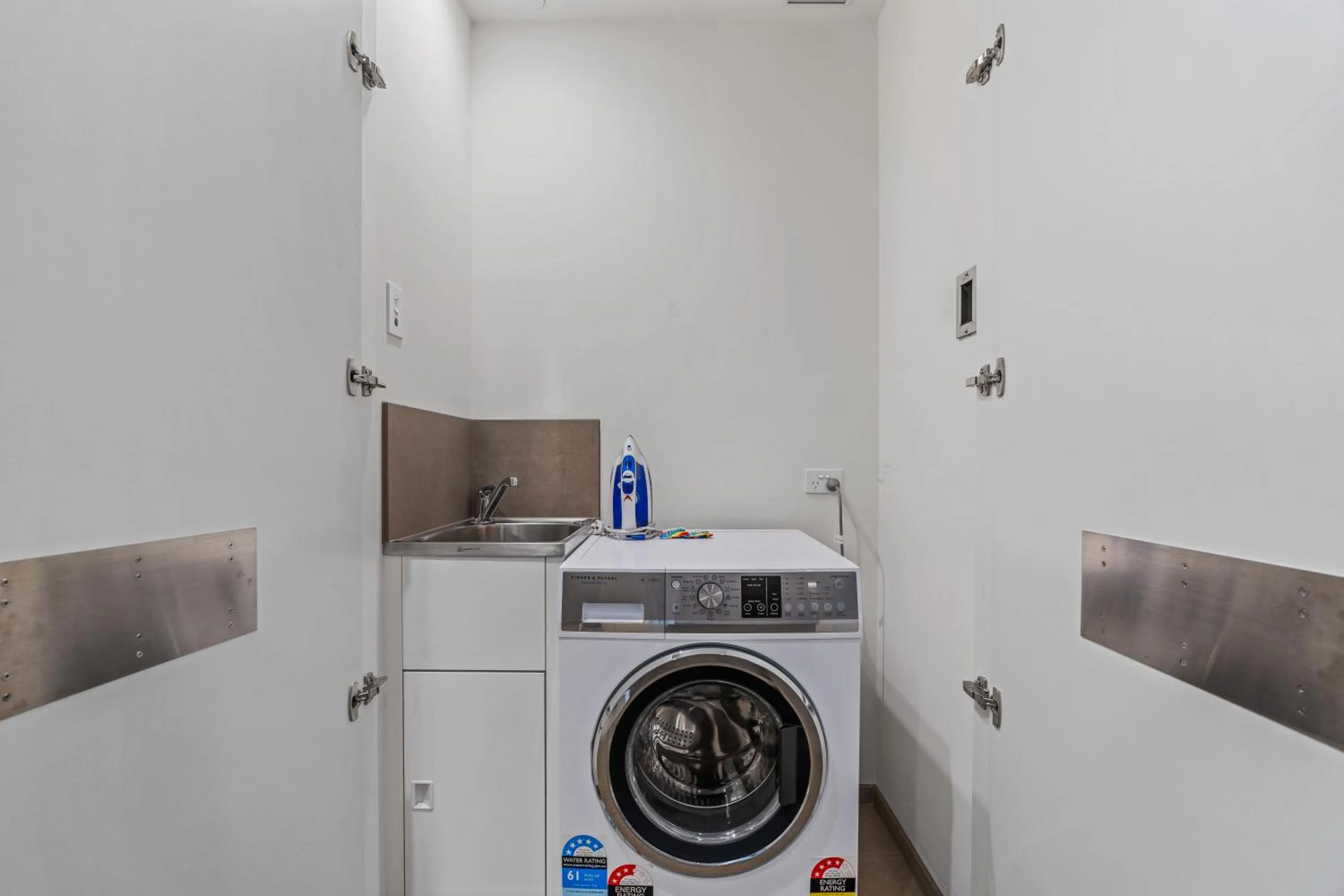 washing machine in CLLIX Australia 108 Apartments