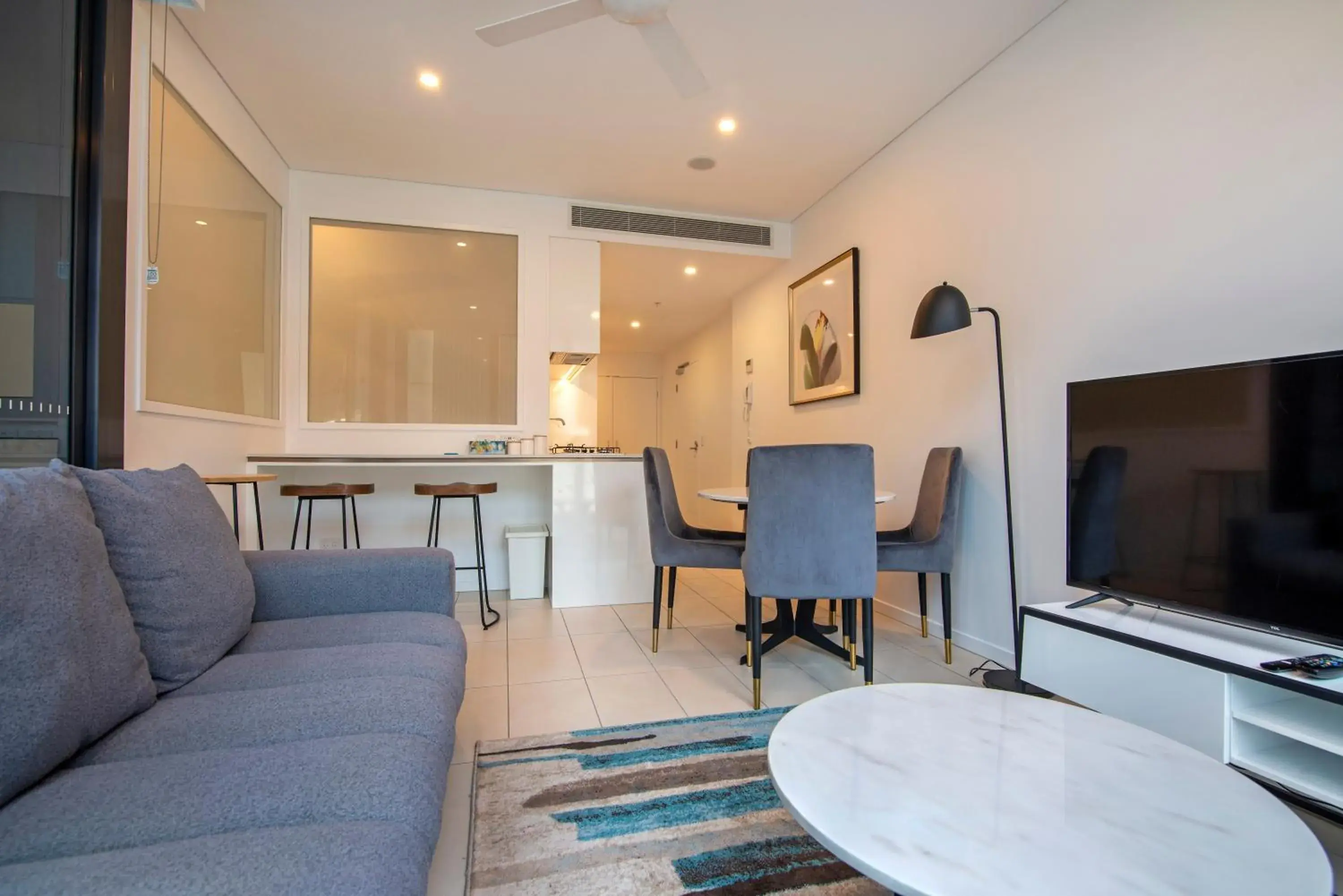 Living room in Hope Street Apartments by CLLIX Living room in Hope Street Apartments by CLLIX