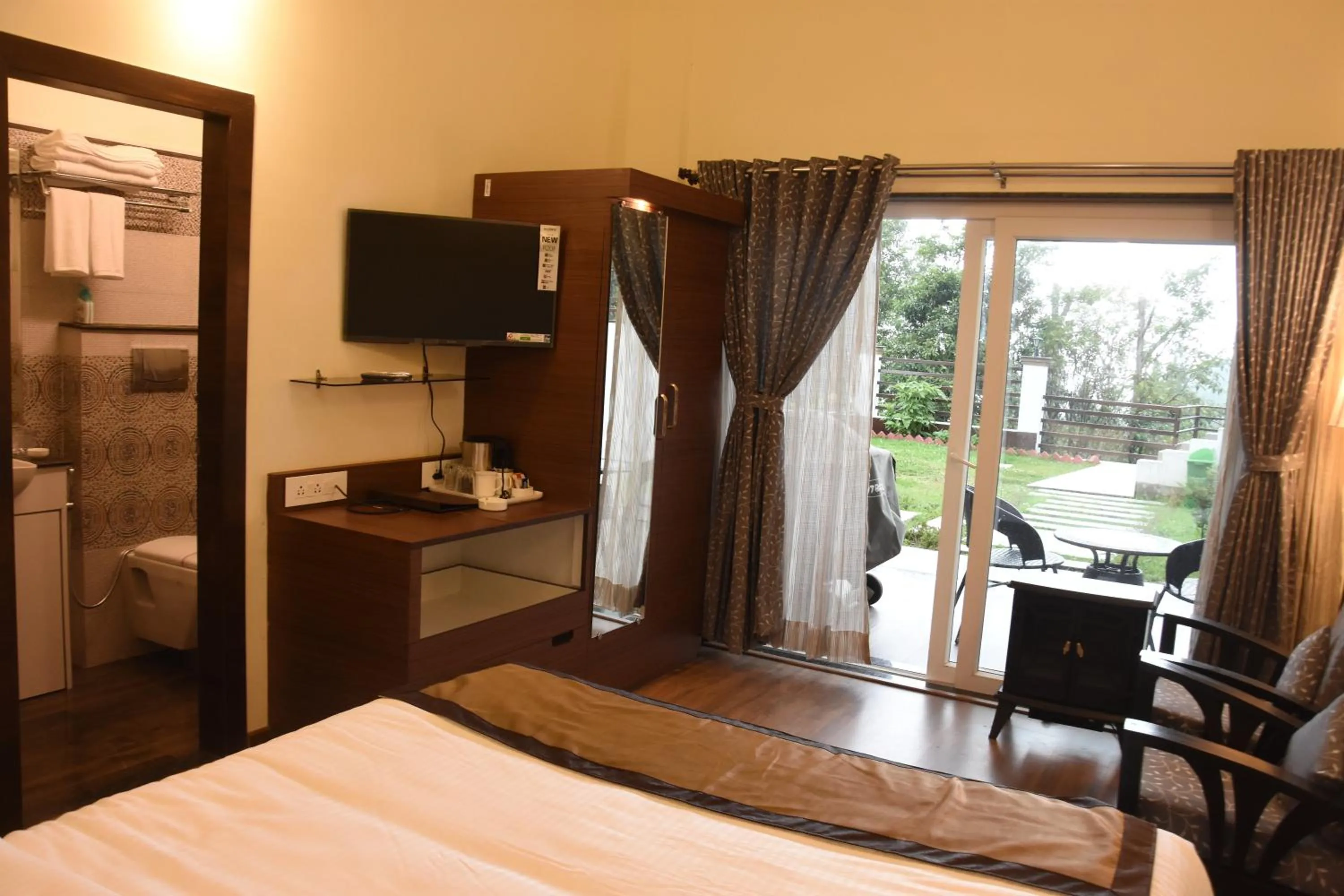 Photo of the whole room, Bed in Nirvana Retreat