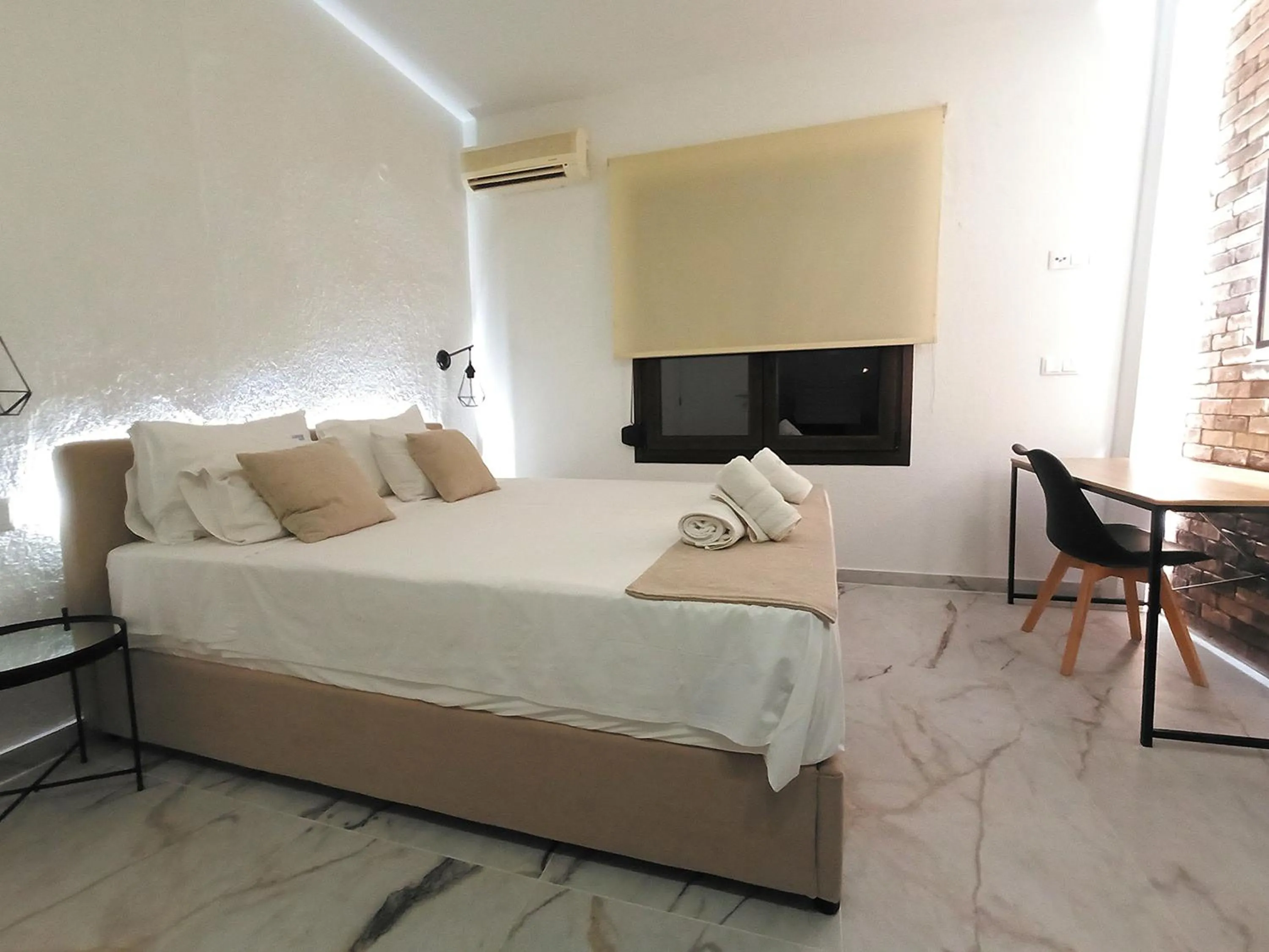 Bed in Salonikiou Beach Apartments & Villas