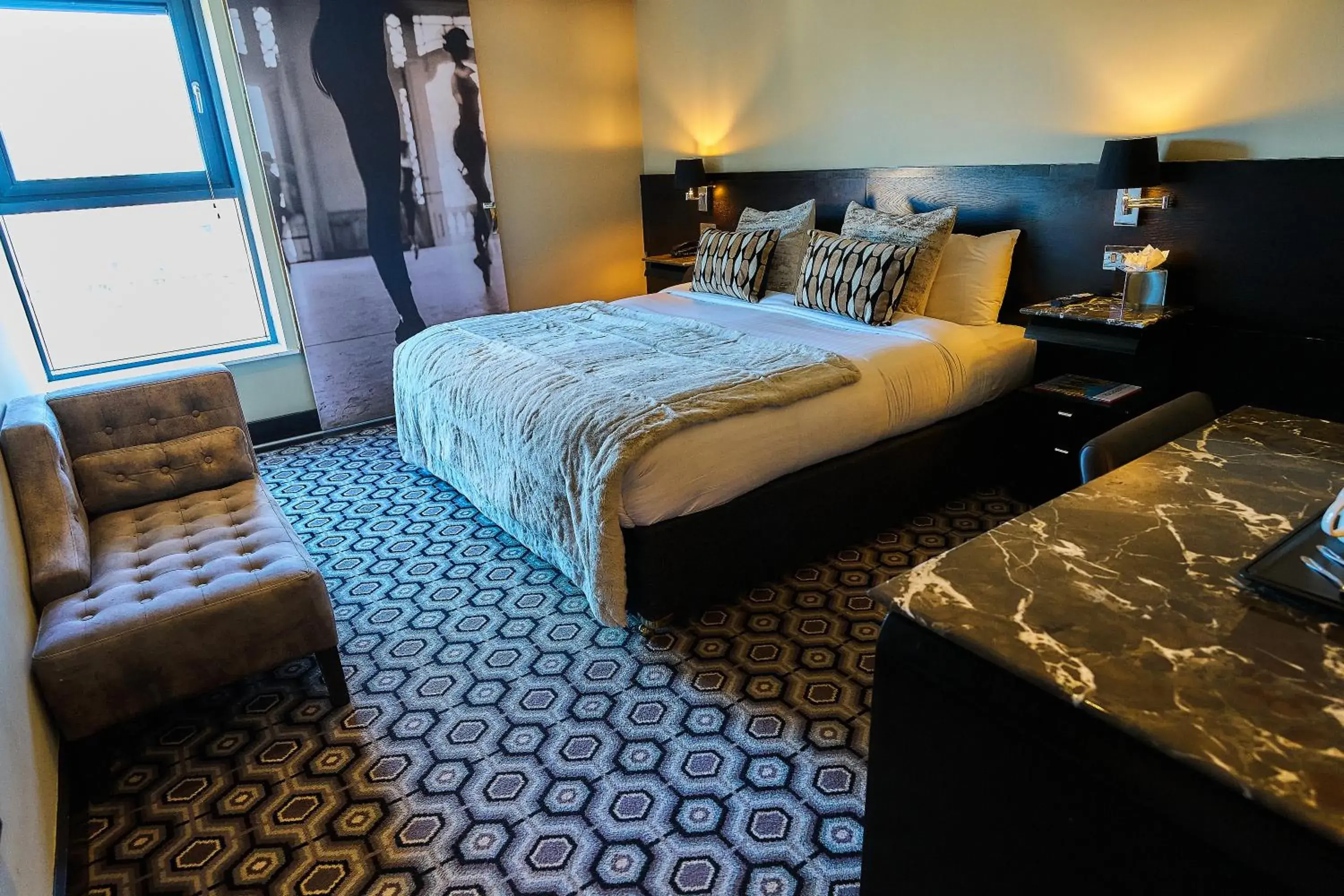 Bed in The Vincent Hotel Bed in The Vincent Hotel