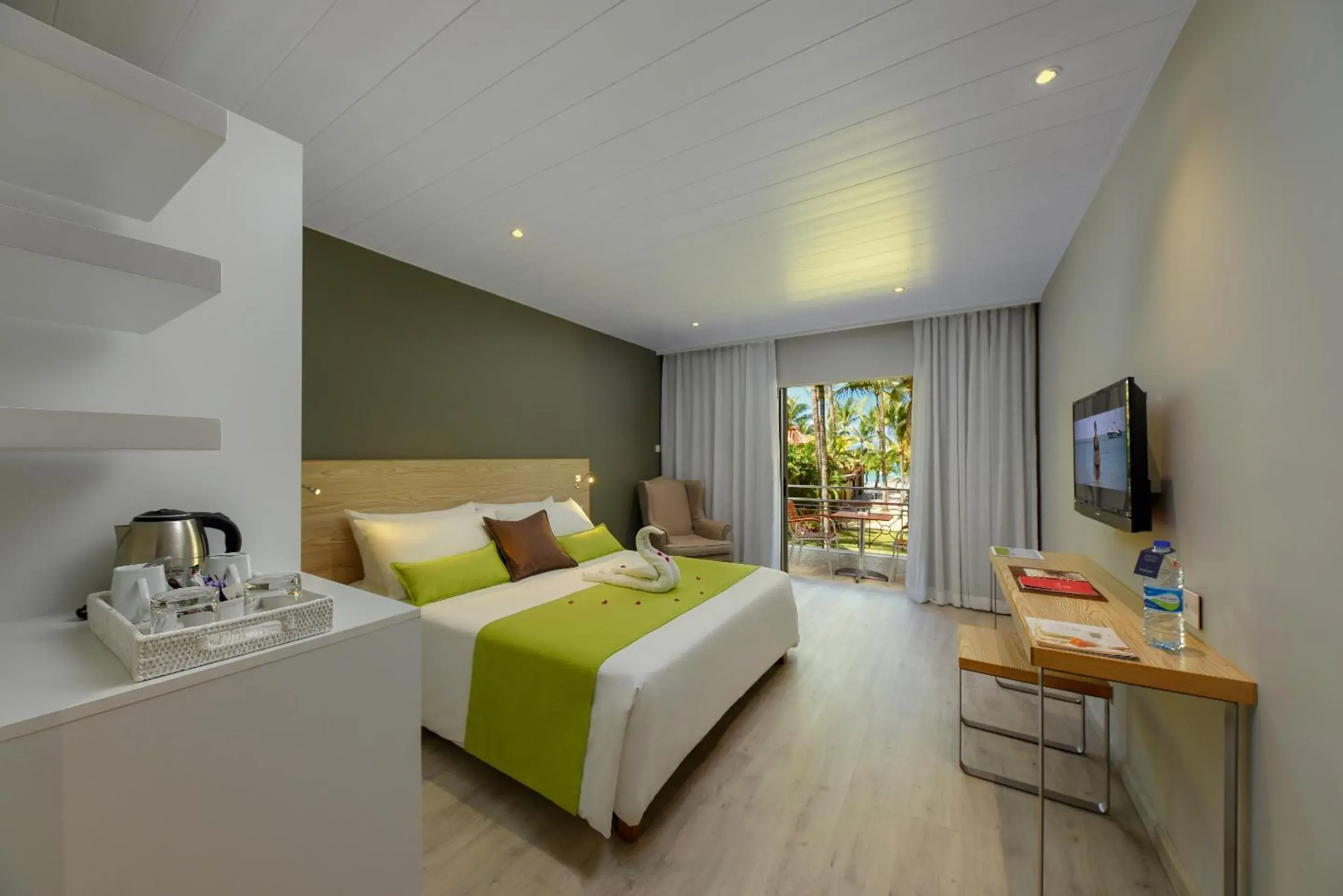 Balcony/Terrace, Bed in Mauricia Beachcomber Resort & Spa Balcony/Terrace, Bed in Mauricia Beachcomber Resort & Spa
