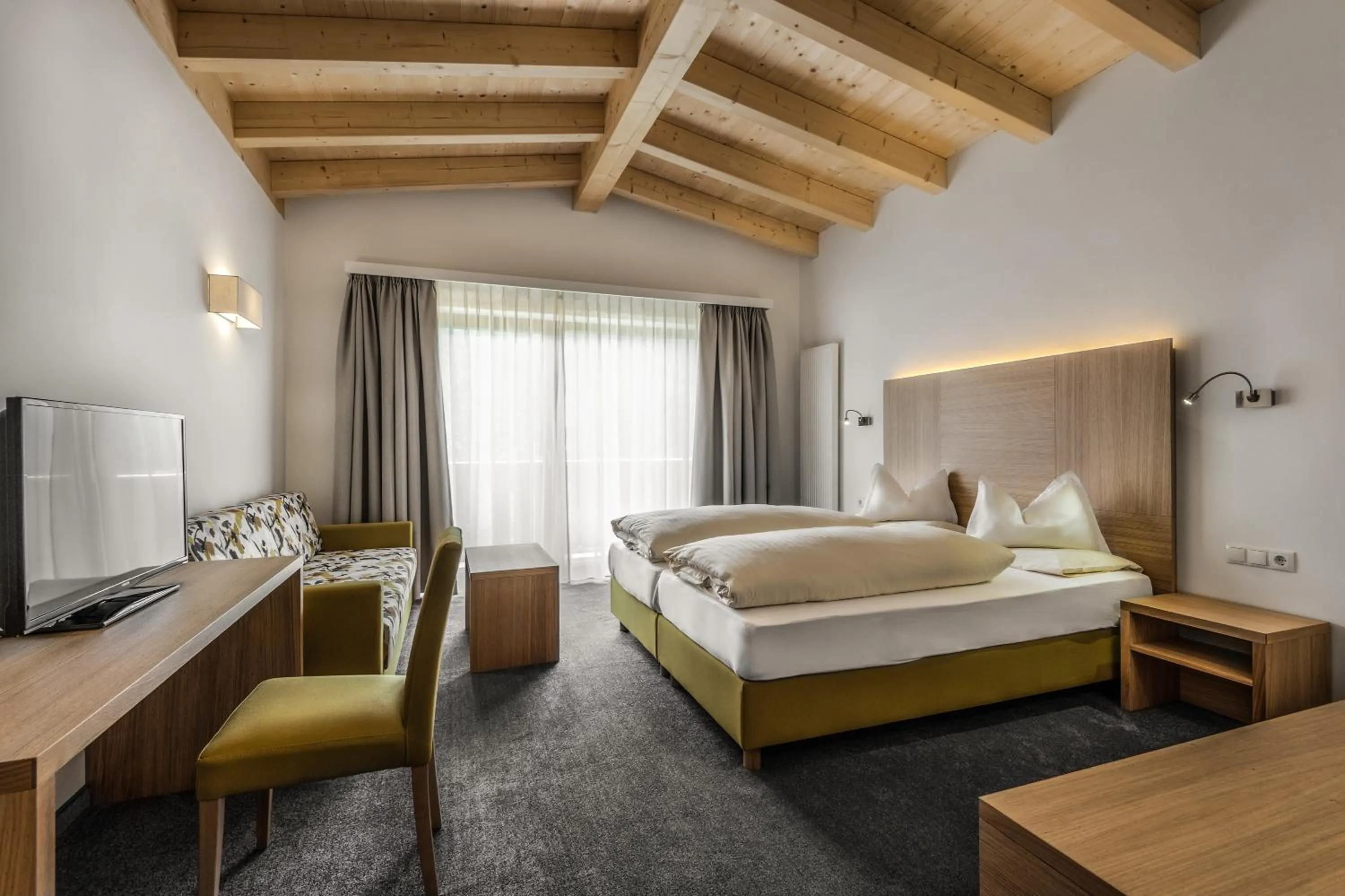 Photo of the whole room, Bed in Hotel Miramonti Badia