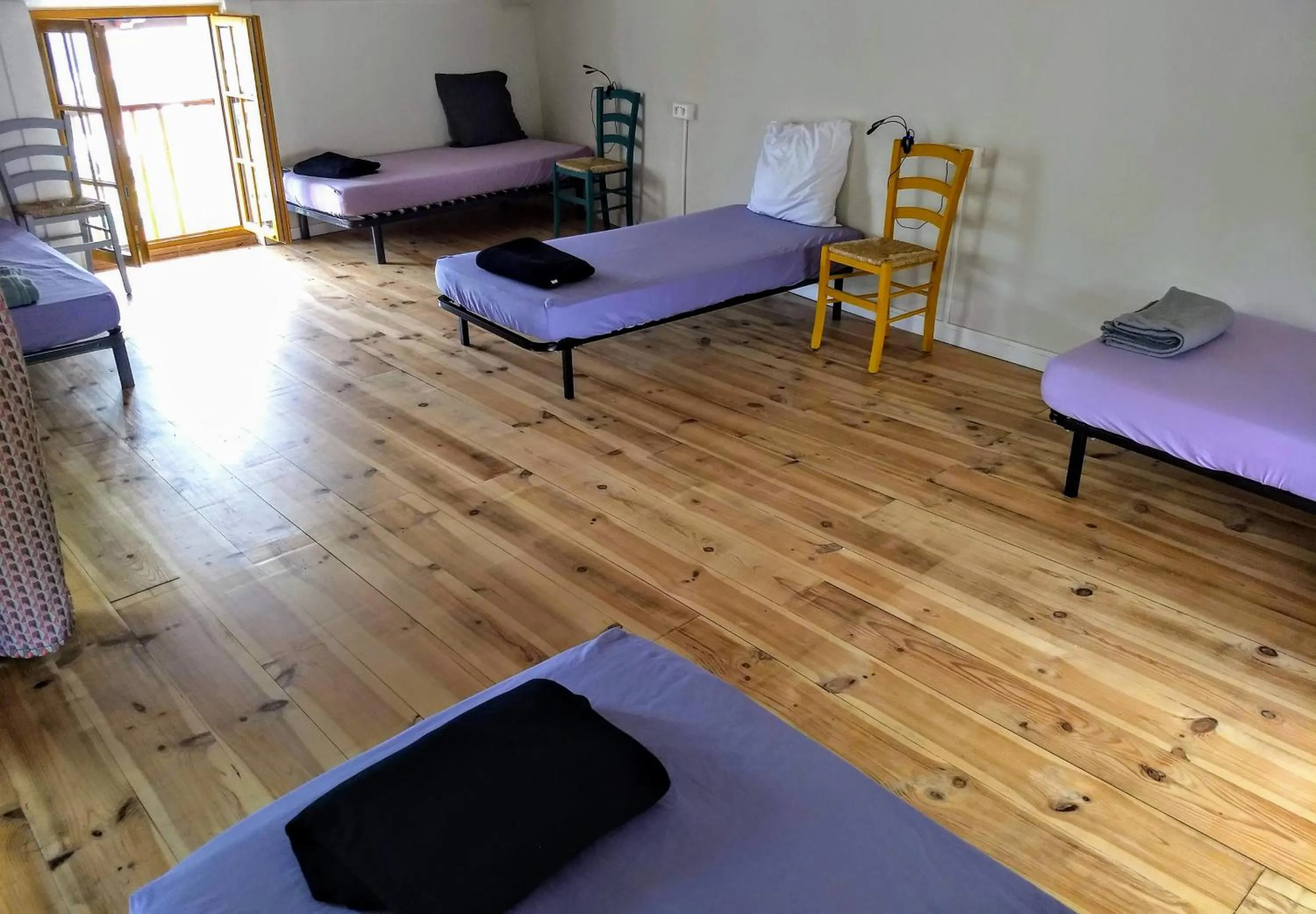 Bed in Gite de la Porte Saint Jacques: a hostel for pilgrims