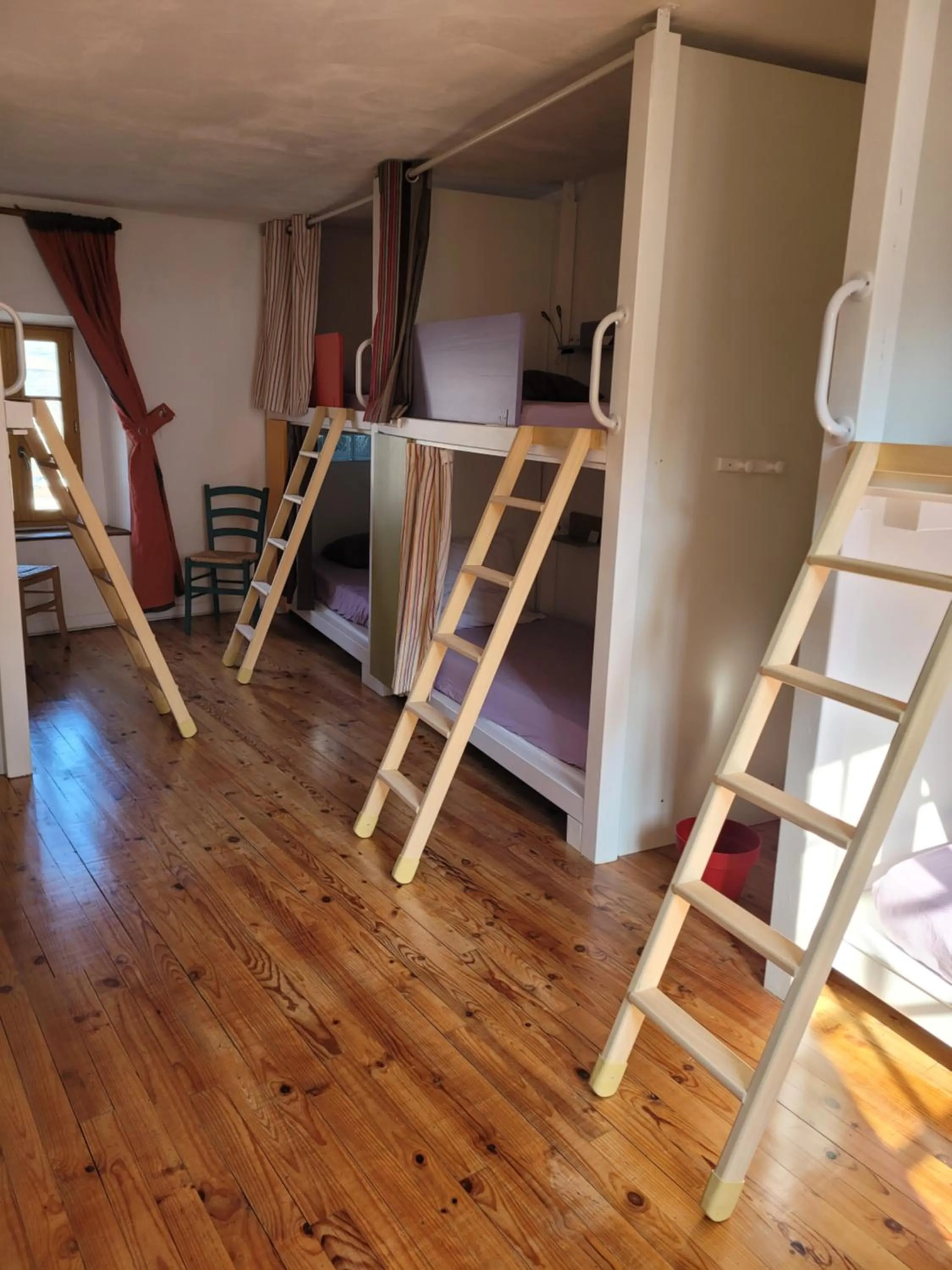 Bed in Gite de la Porte Saint Jacques: a hostel for pilgrims