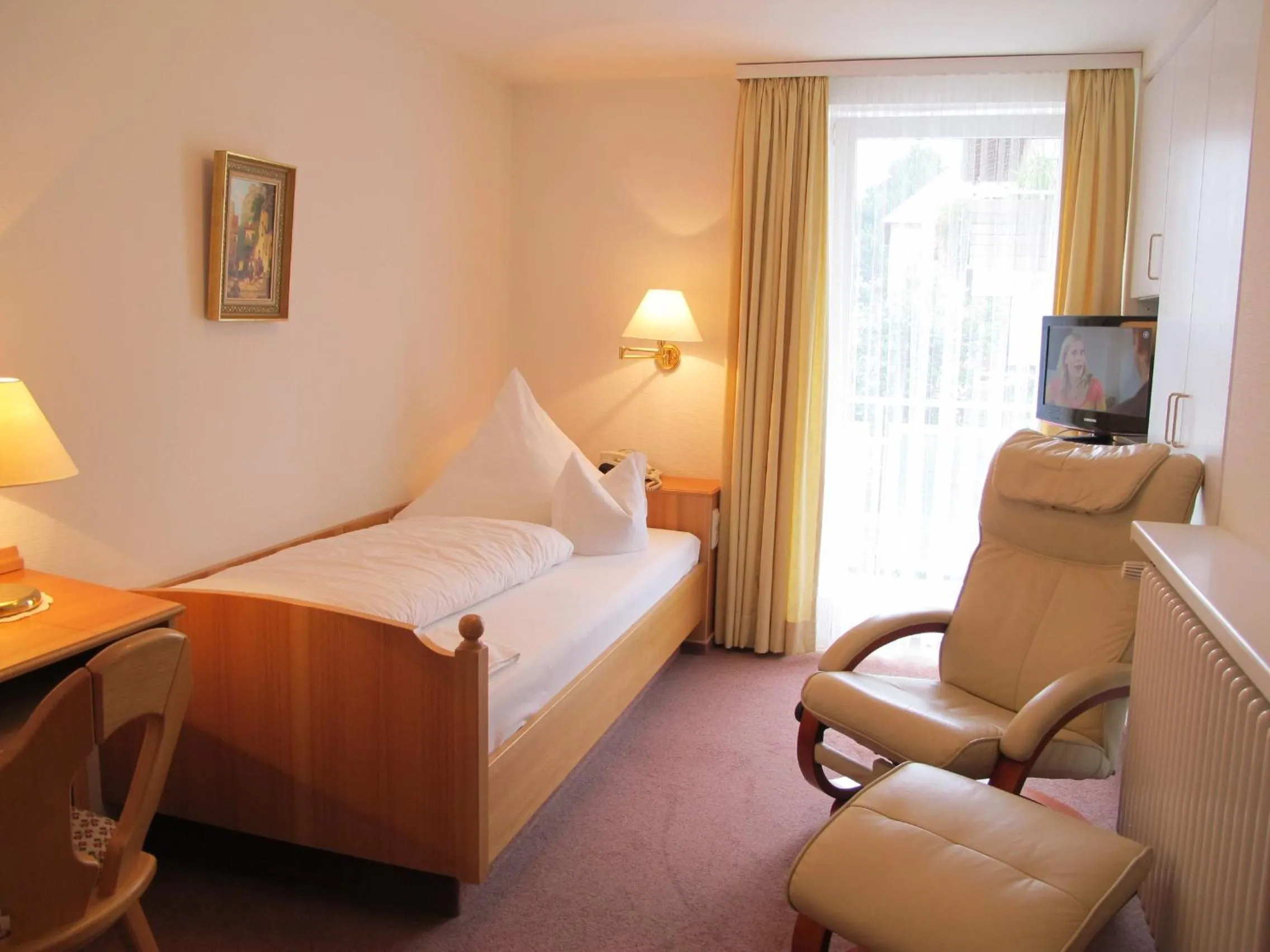 Bed in Hotel Germania