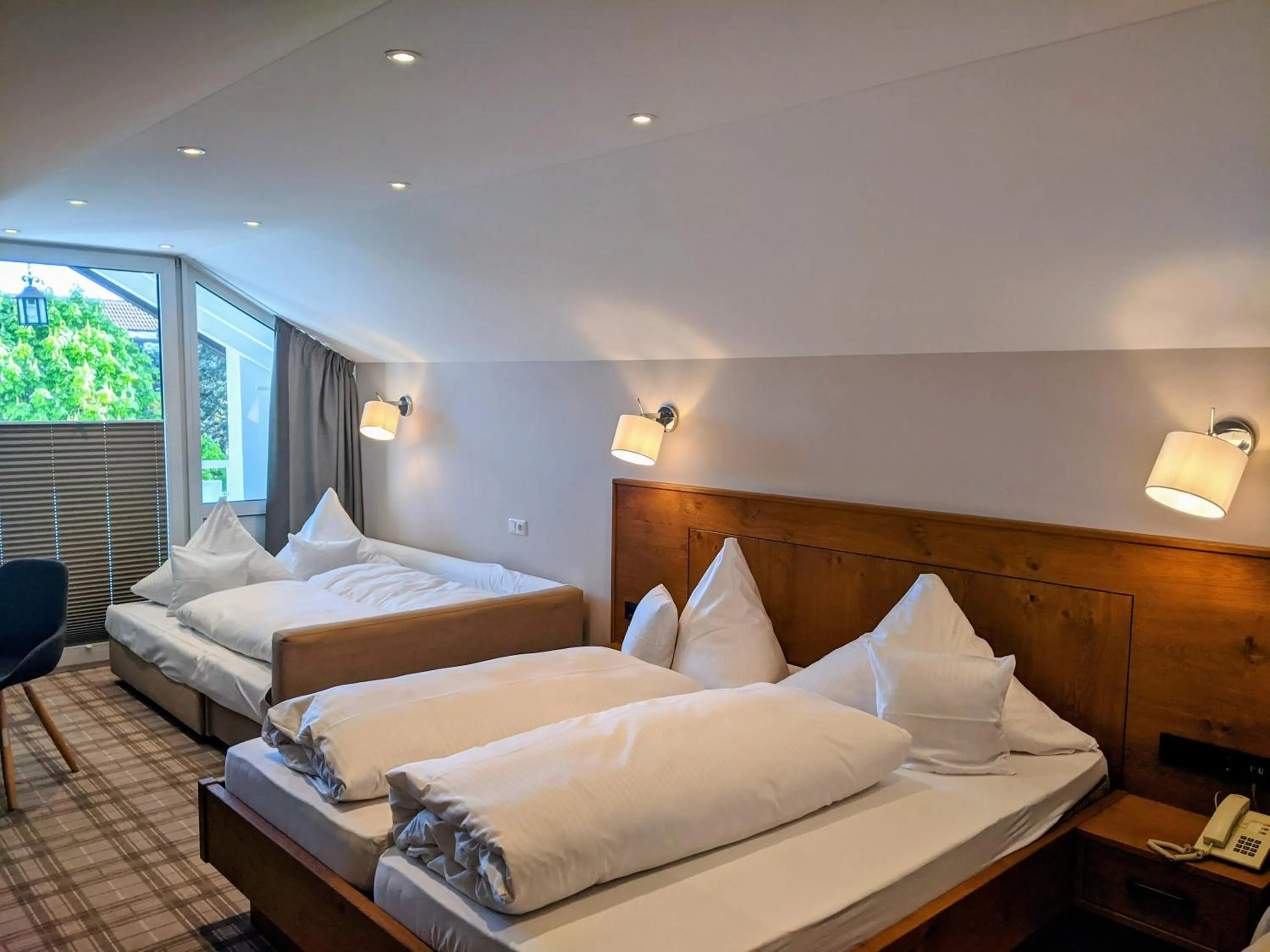 Bed in Hotel Germania