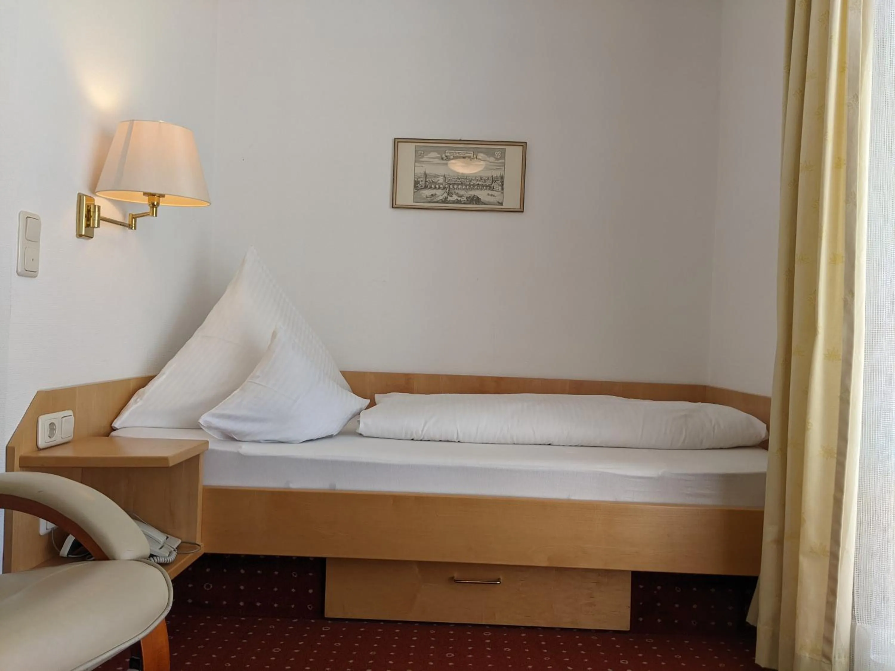 Bed in Hotel Germania