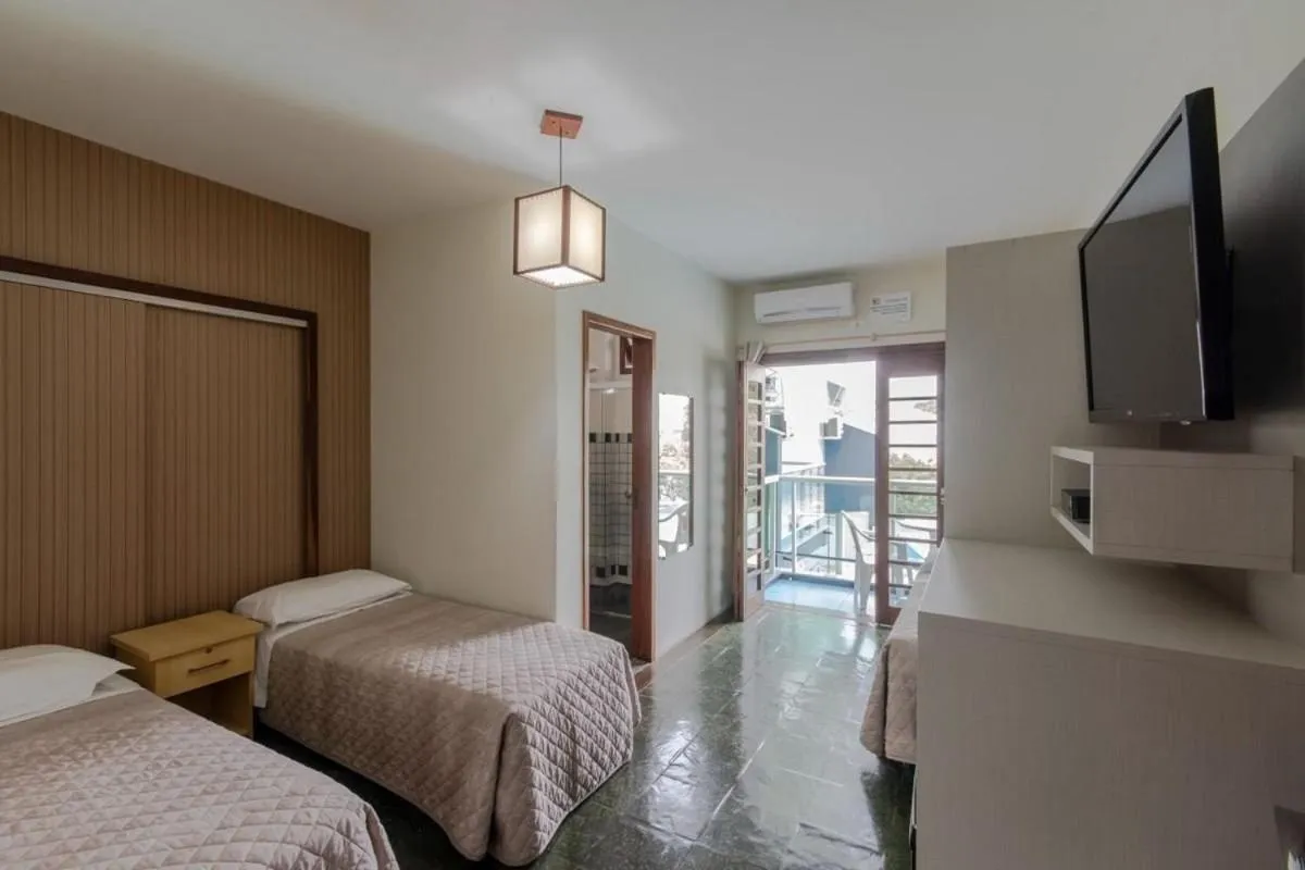 Photo of the whole room, Bed in Hotel Cores do Mar