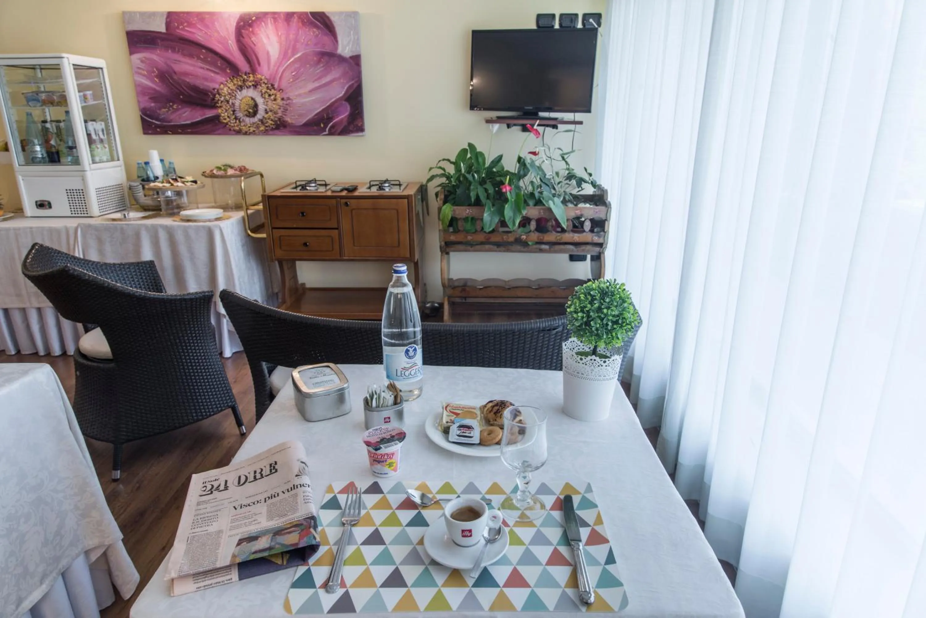 Communal lounge/ TV room in Hotel Villa Maria