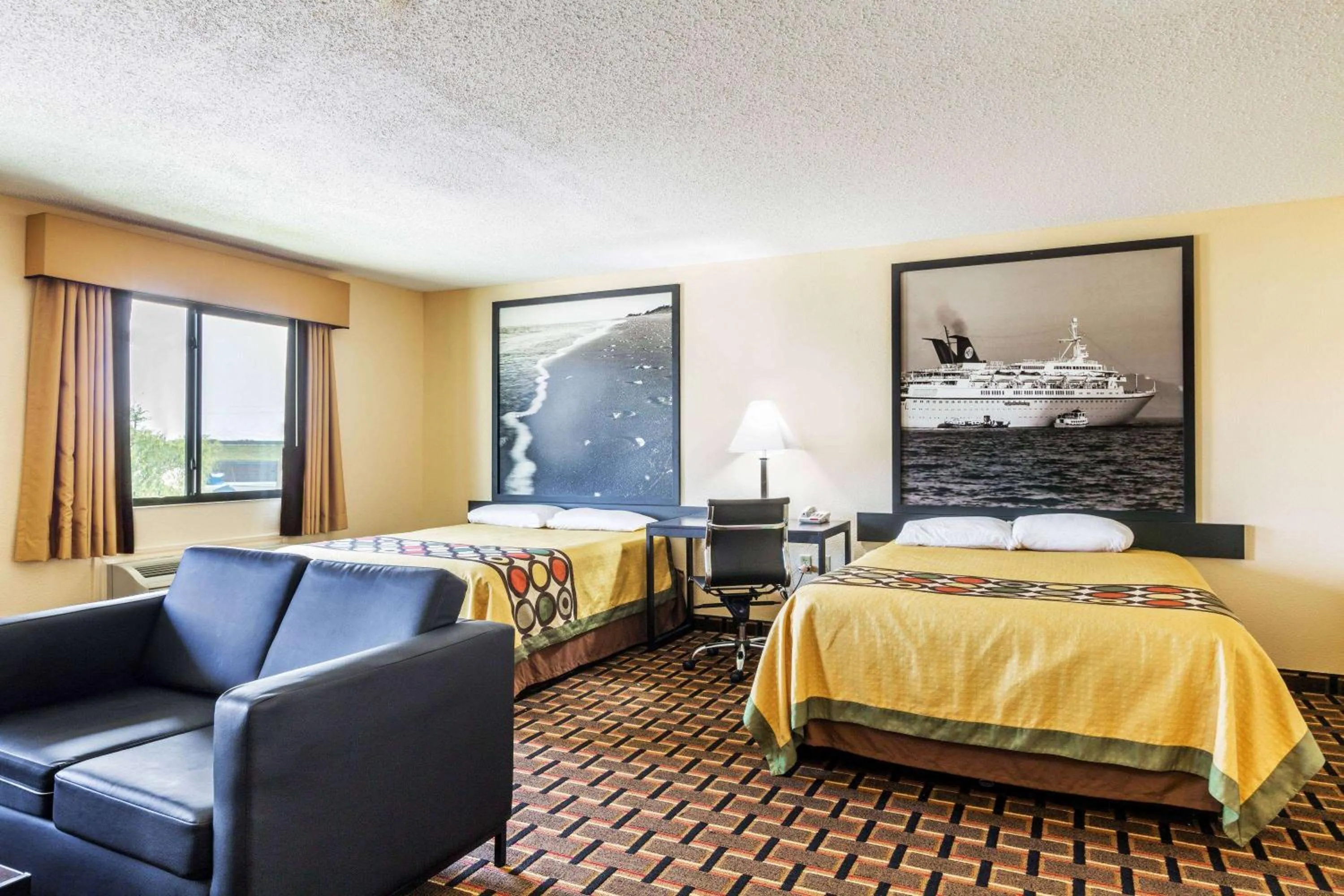 Bed in Super 8 by Wyndham League City Kemah Area