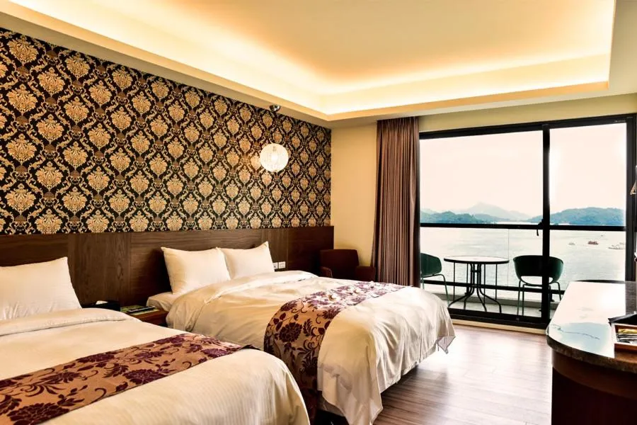 Bed in Miracolo View Hotel