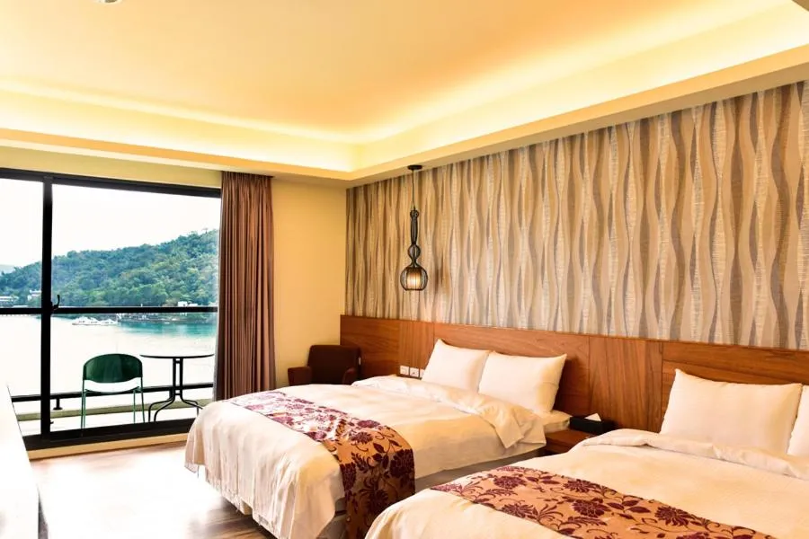 Bed in Miracolo View Hotel