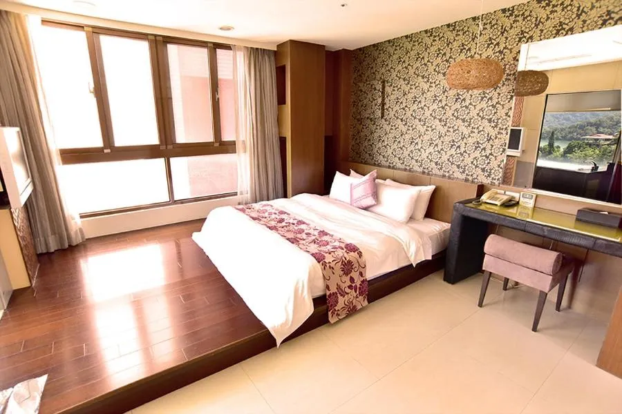 Bed in Miracolo View Hotel