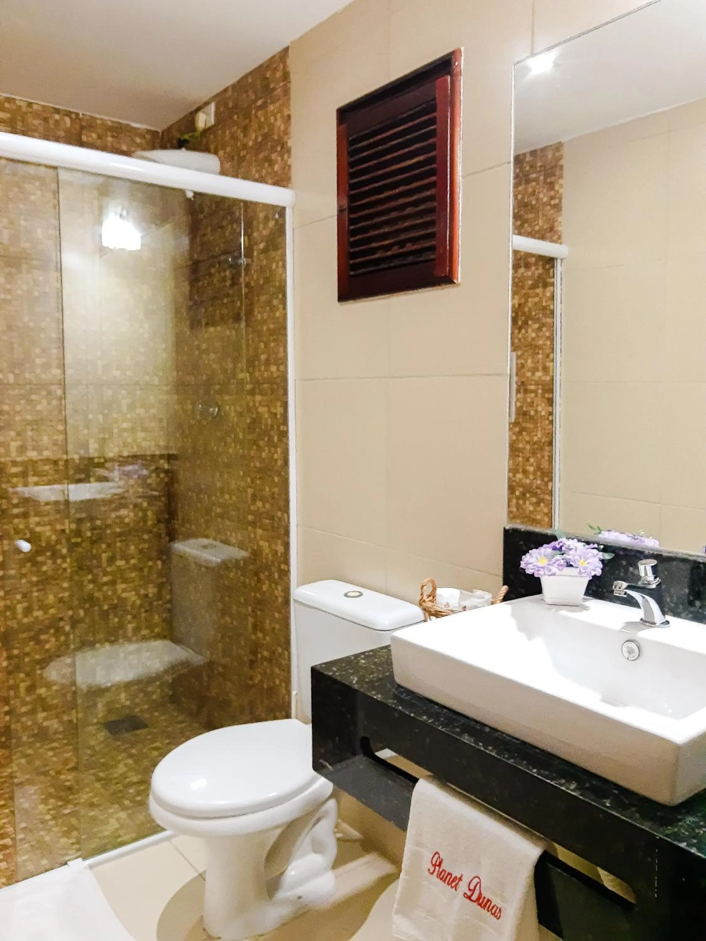 Bathroom in Planet Dunas Residence