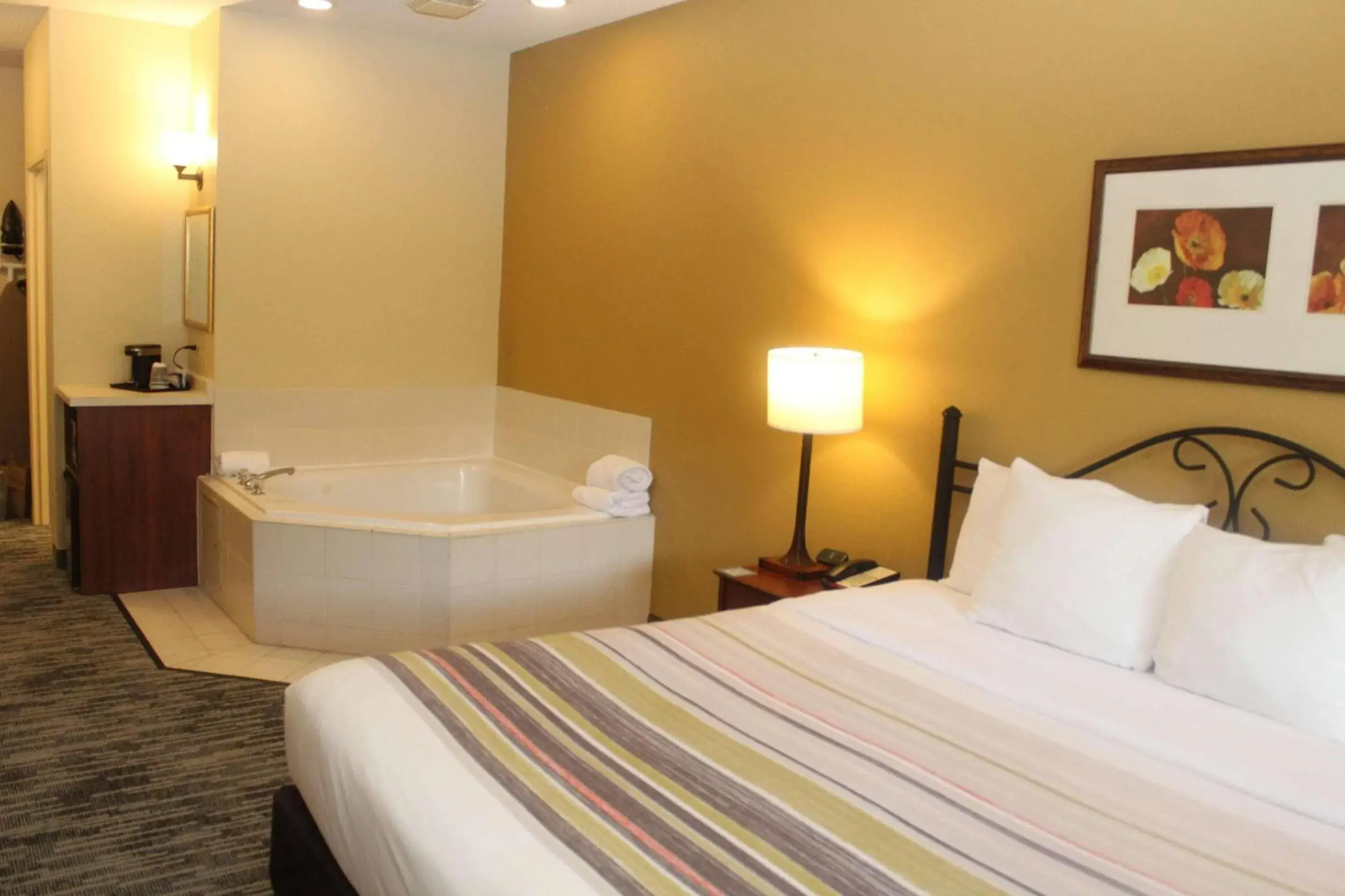 Bedroom, Bed in Country Inn & Suites by Radisson, Crystal Lake, IL Bedroom, Bed in Country Inn & Suites by Radisson, Crystal Lake, IL