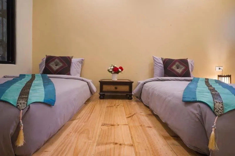 Bed in Sri Anan Pura Hotel