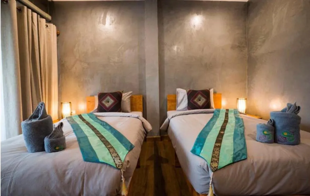 Bed in Sri Anan Pura Hotel