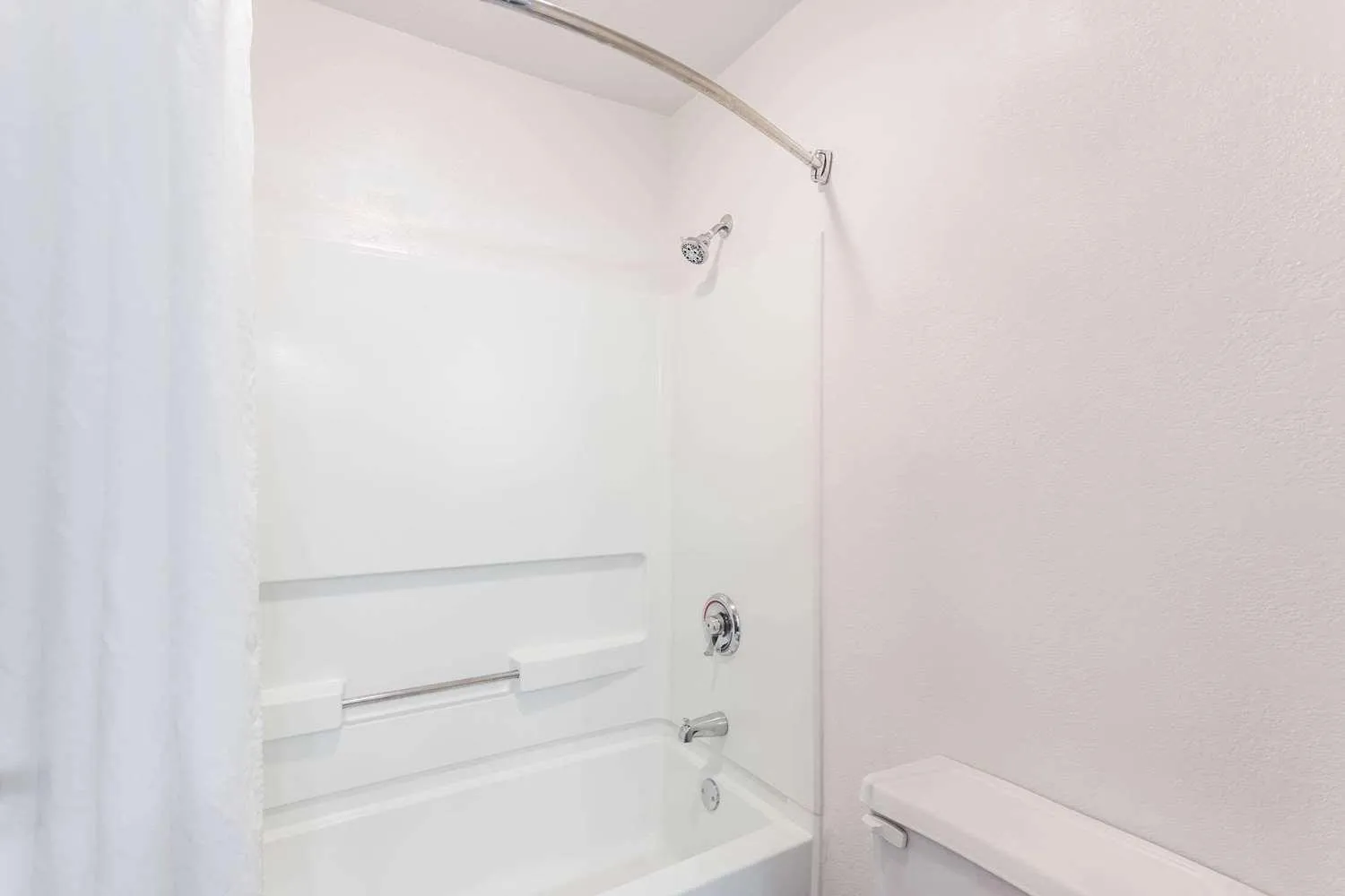 Bathroom in Super 8 by Wyndham Joliet I-55 N/Chicago