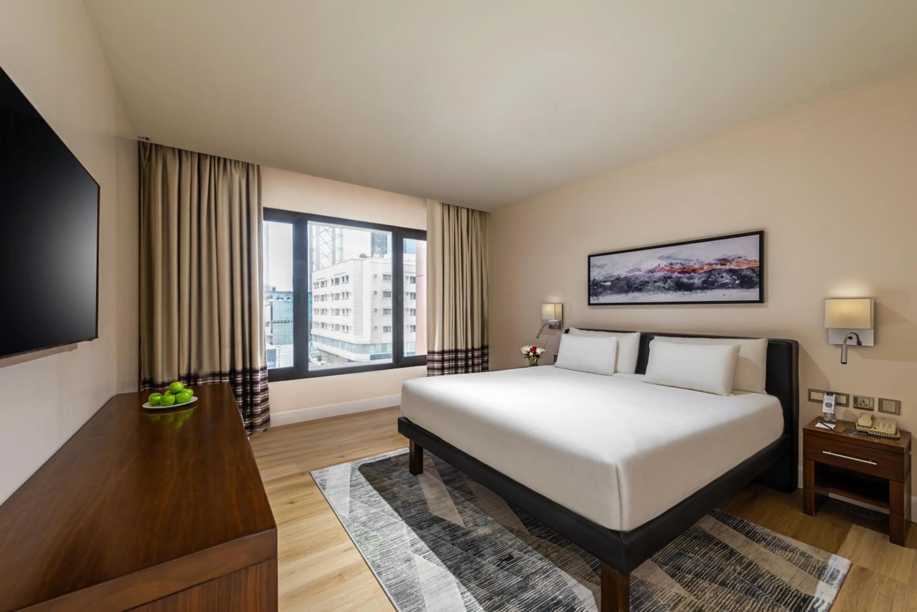 Bed in Novotel Suites Riyadh Olaya