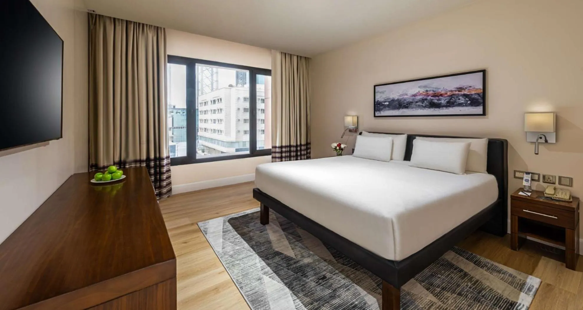 Bed in Novotel Suites Riyadh Olaya