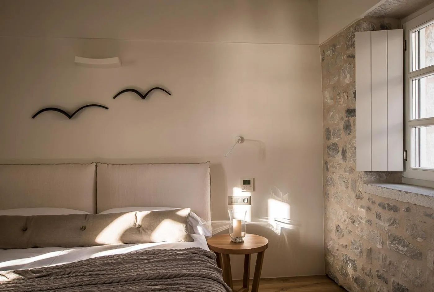 Bed in BASSA MAINA Villas & Suites