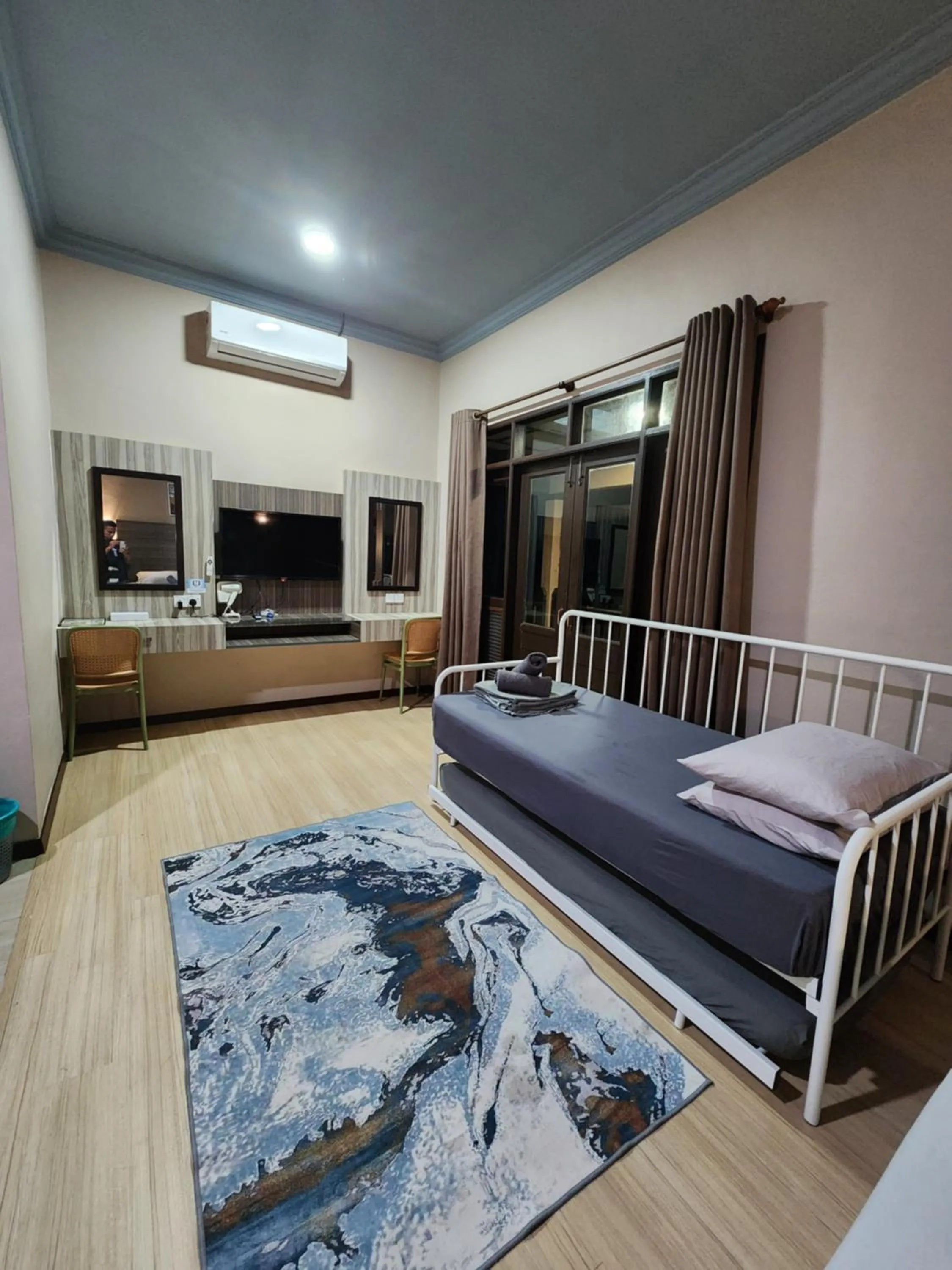 Bed in Pandan Laut Beach Resort