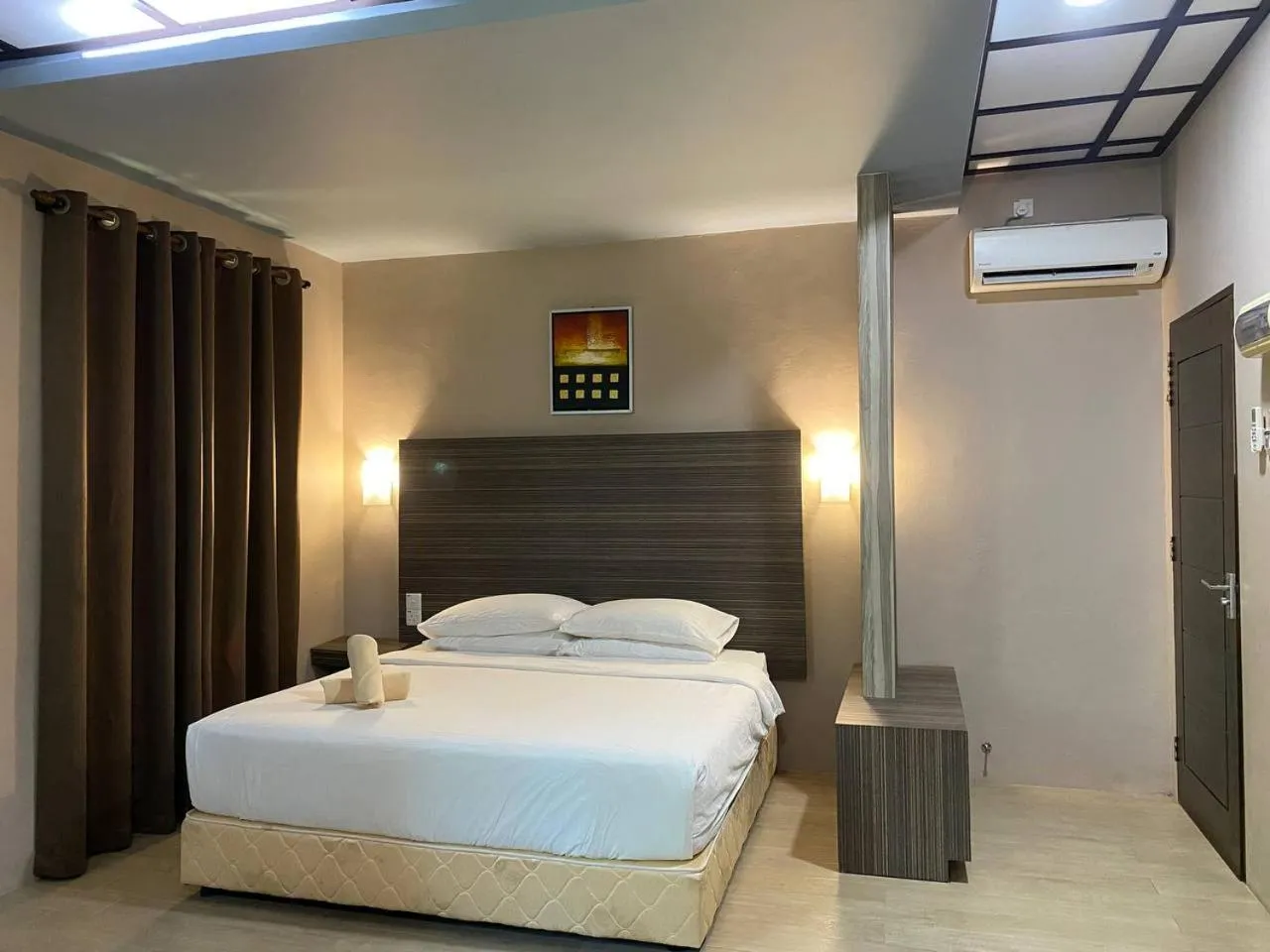 Bed in Pandan Laut Beach Resort