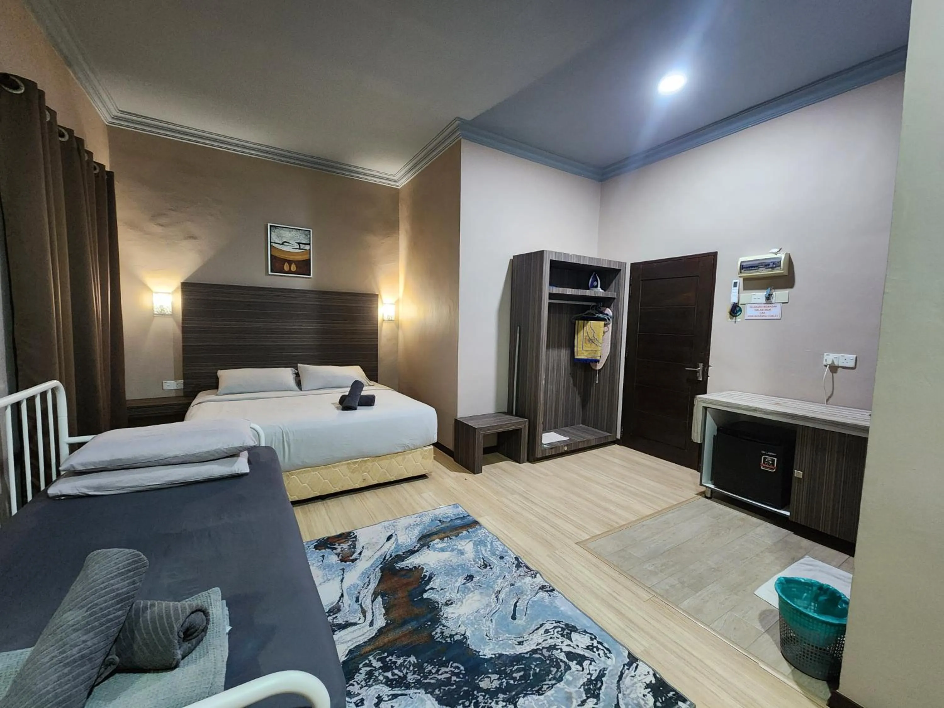 Bed in Pandan Laut Beach Resort