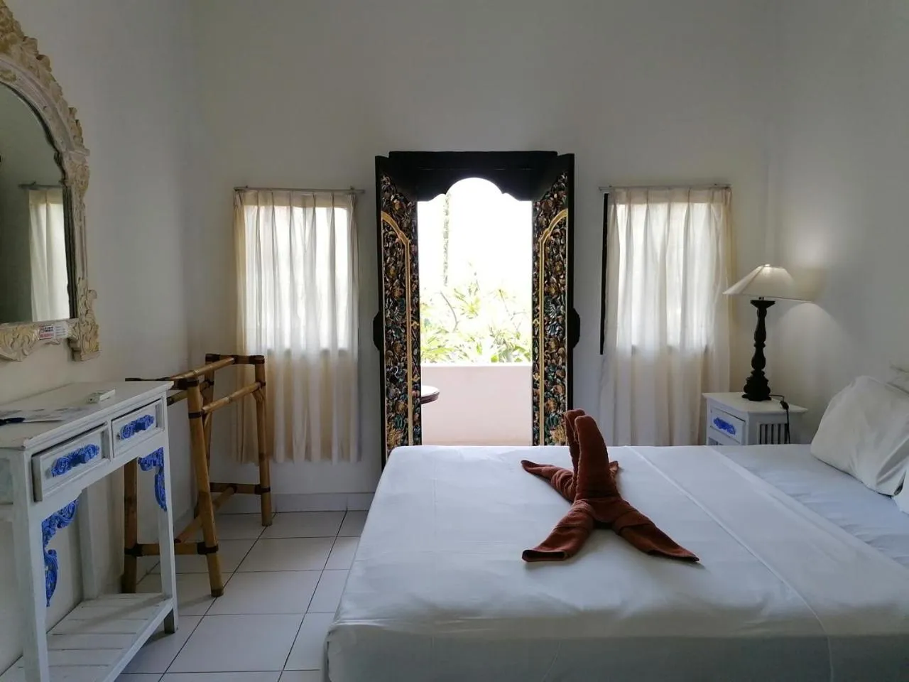 Bed in Puri Oka Beach Bungalows