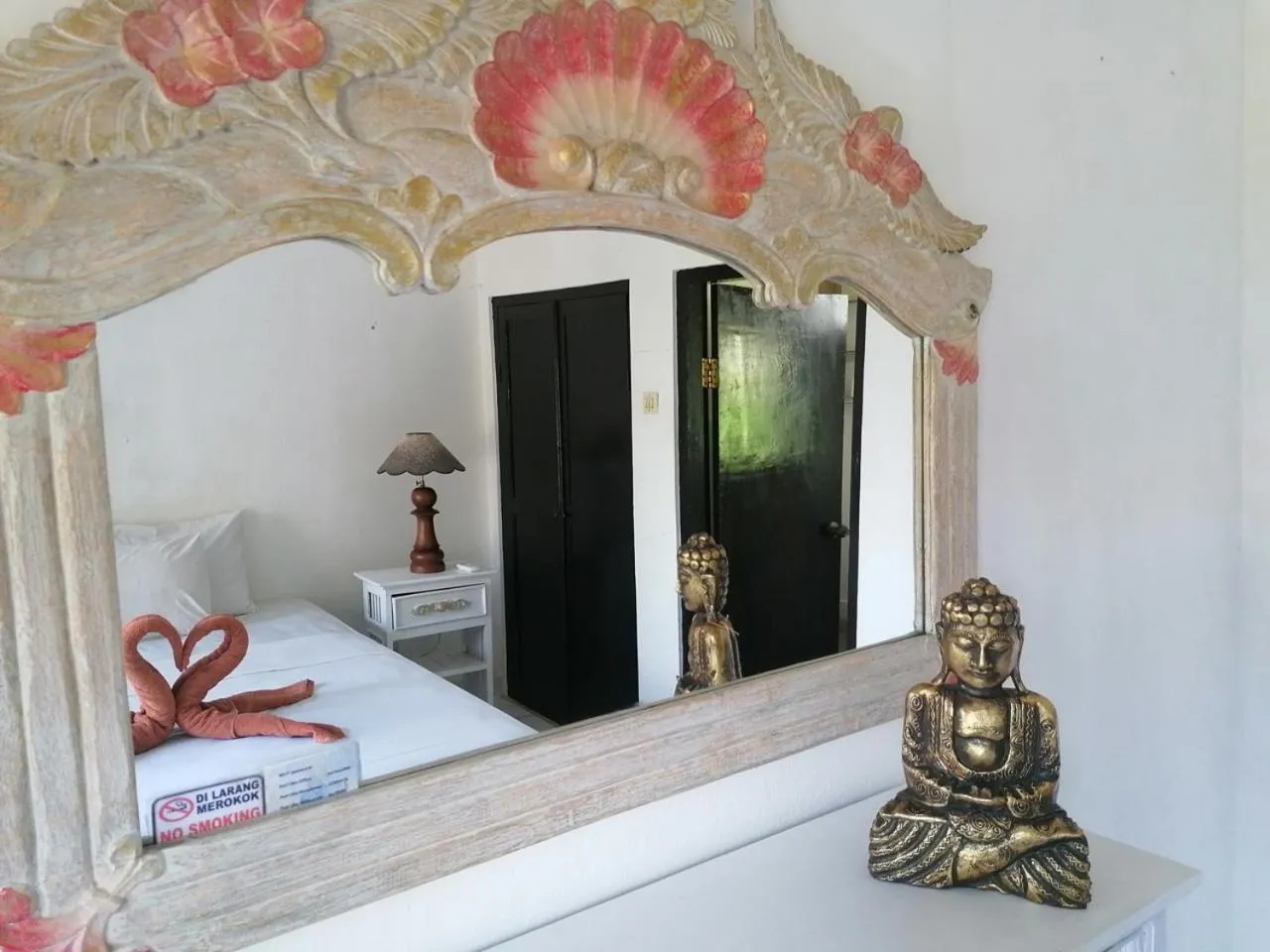 Bed in Puri Oka Beach Bungalows