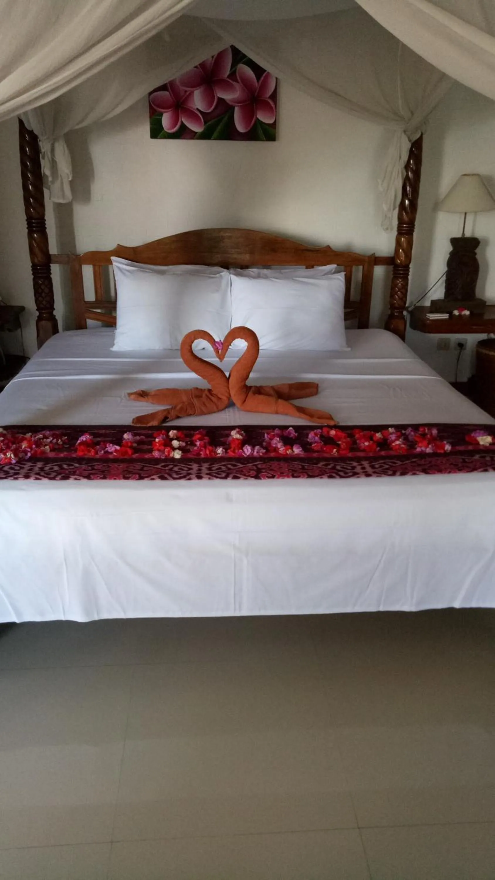 Bed in Puri Oka Beach Bungalows