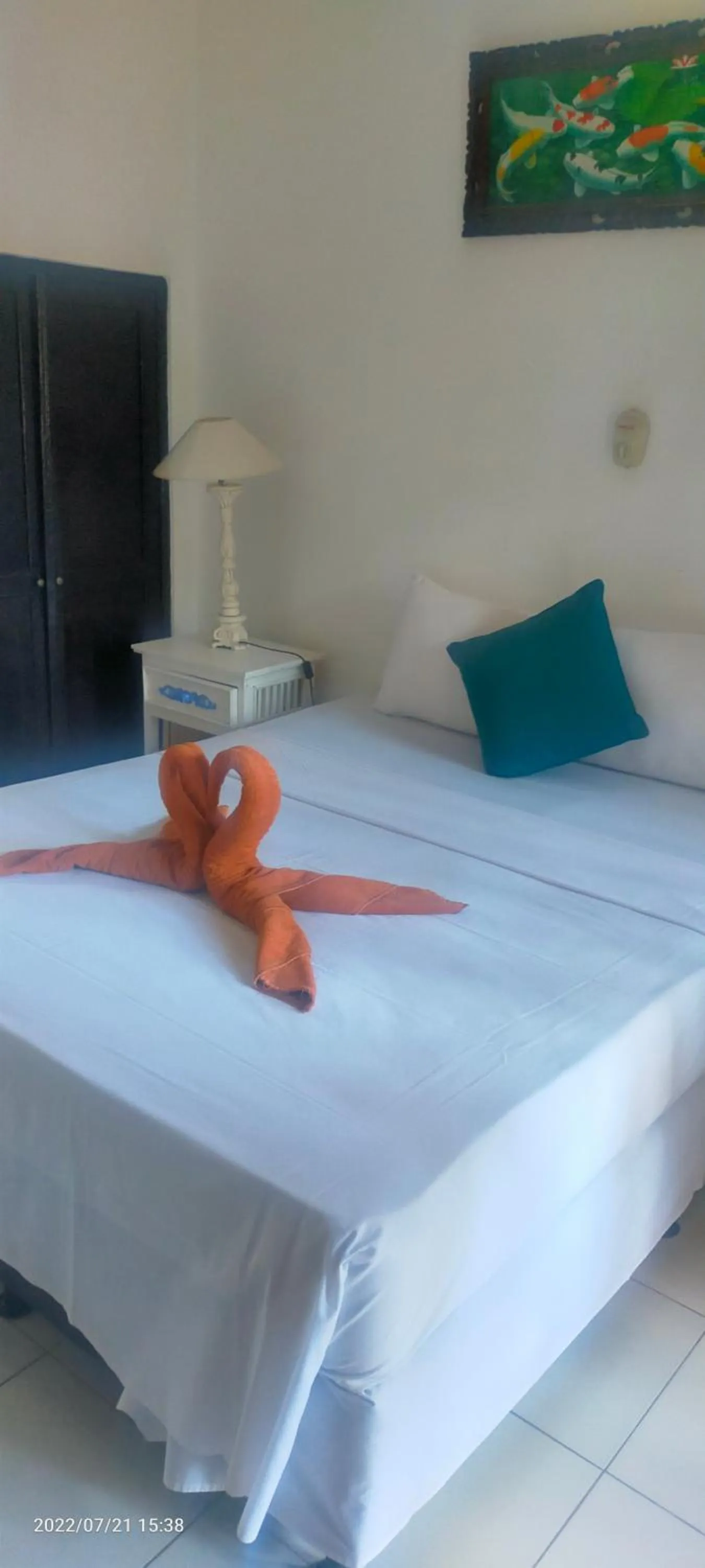 Bed in Puri Oka Beach Bungalows