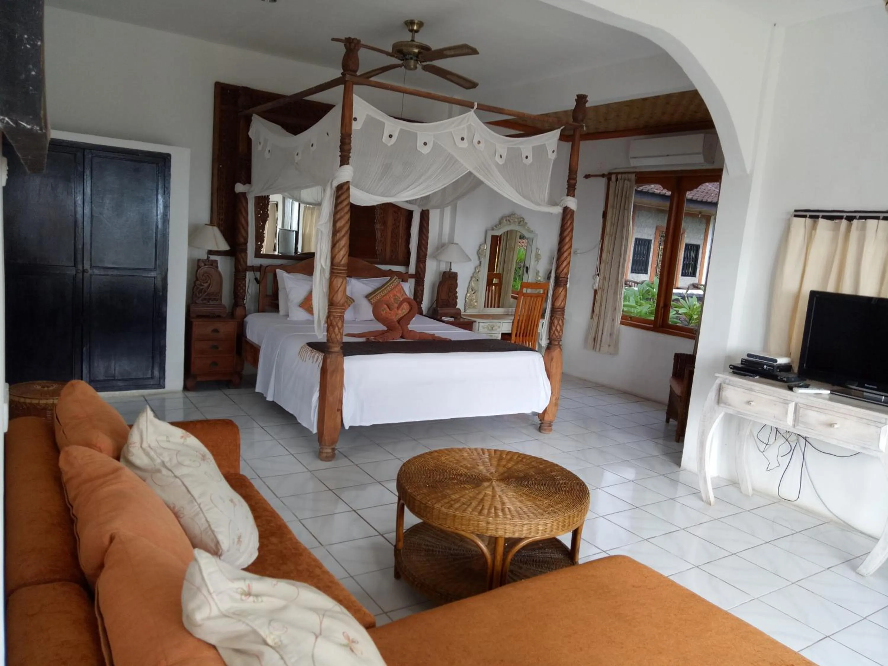 Bed in Puri Oka Beach Bungalows