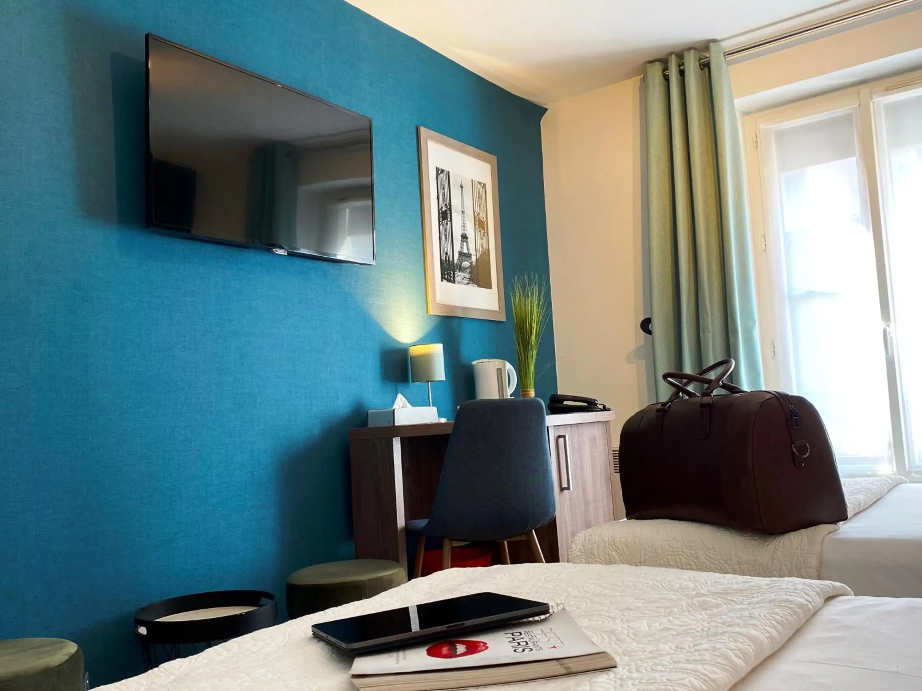 Bed in Hôtel Clairefontaine Bed in Hôtel Clairefontaine