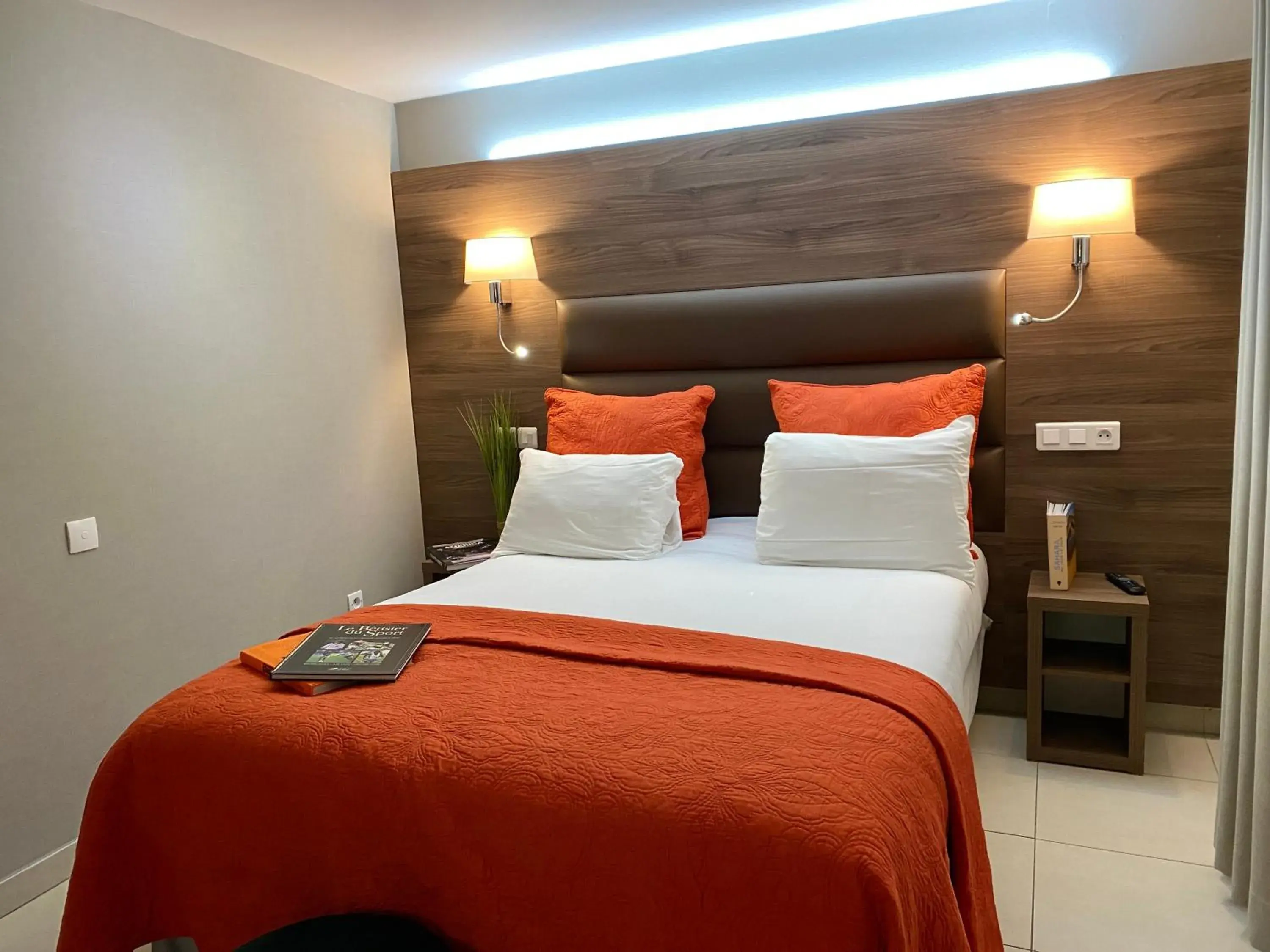 Bed in Hôtel Clairefontaine Bed in Hôtel Clairefontaine