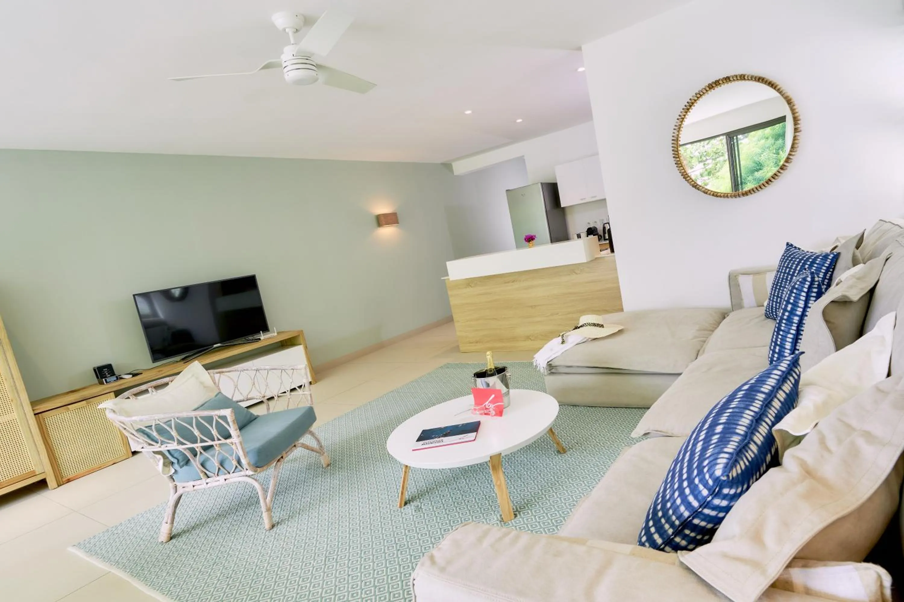 TV and multimedia in Les Estivales Beachfront Suites & Penthouses by LOV Mauritius