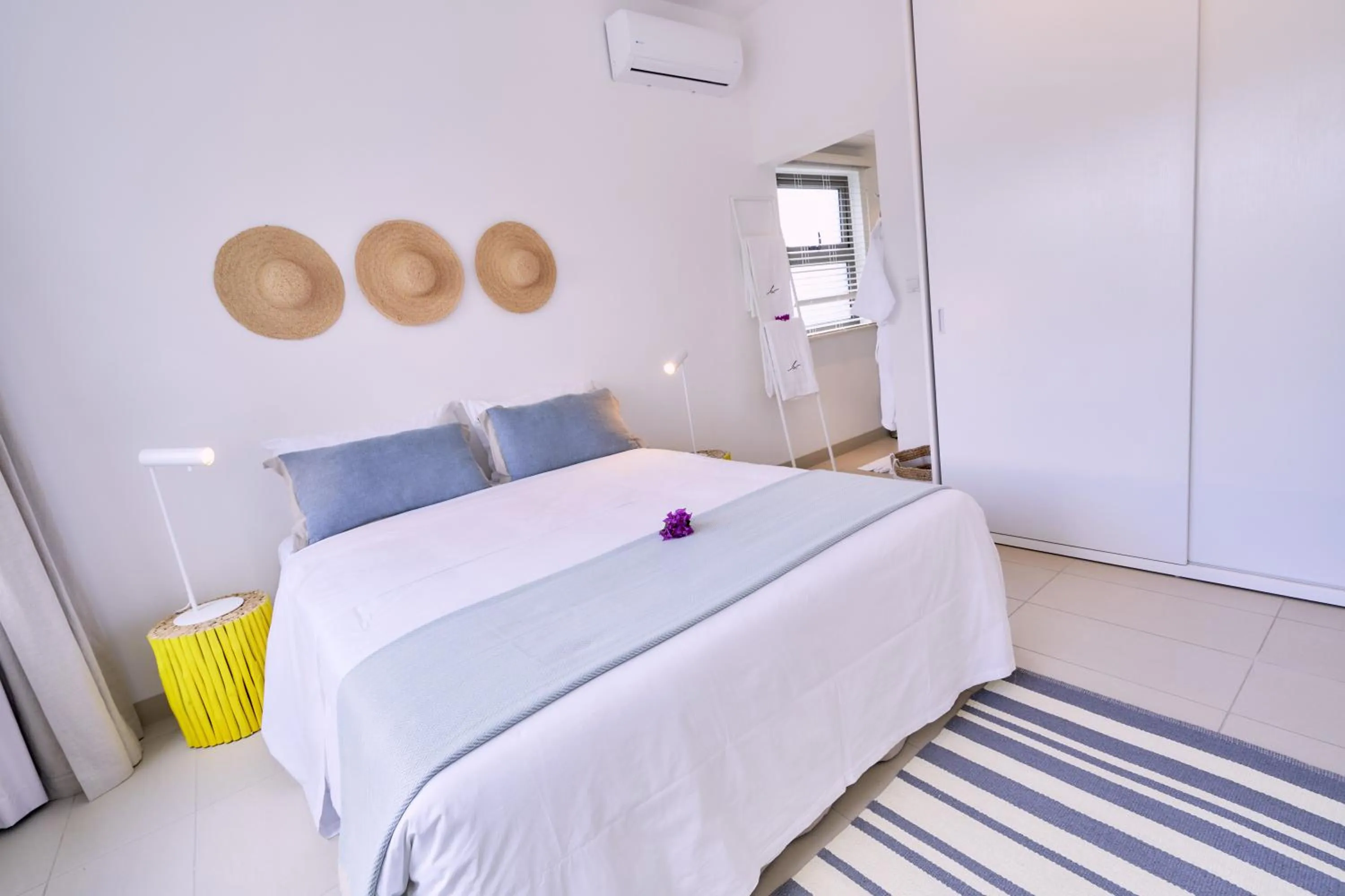 Bed in Les Estivales Beachfront Suites & Penthouses by LOV Mauritius