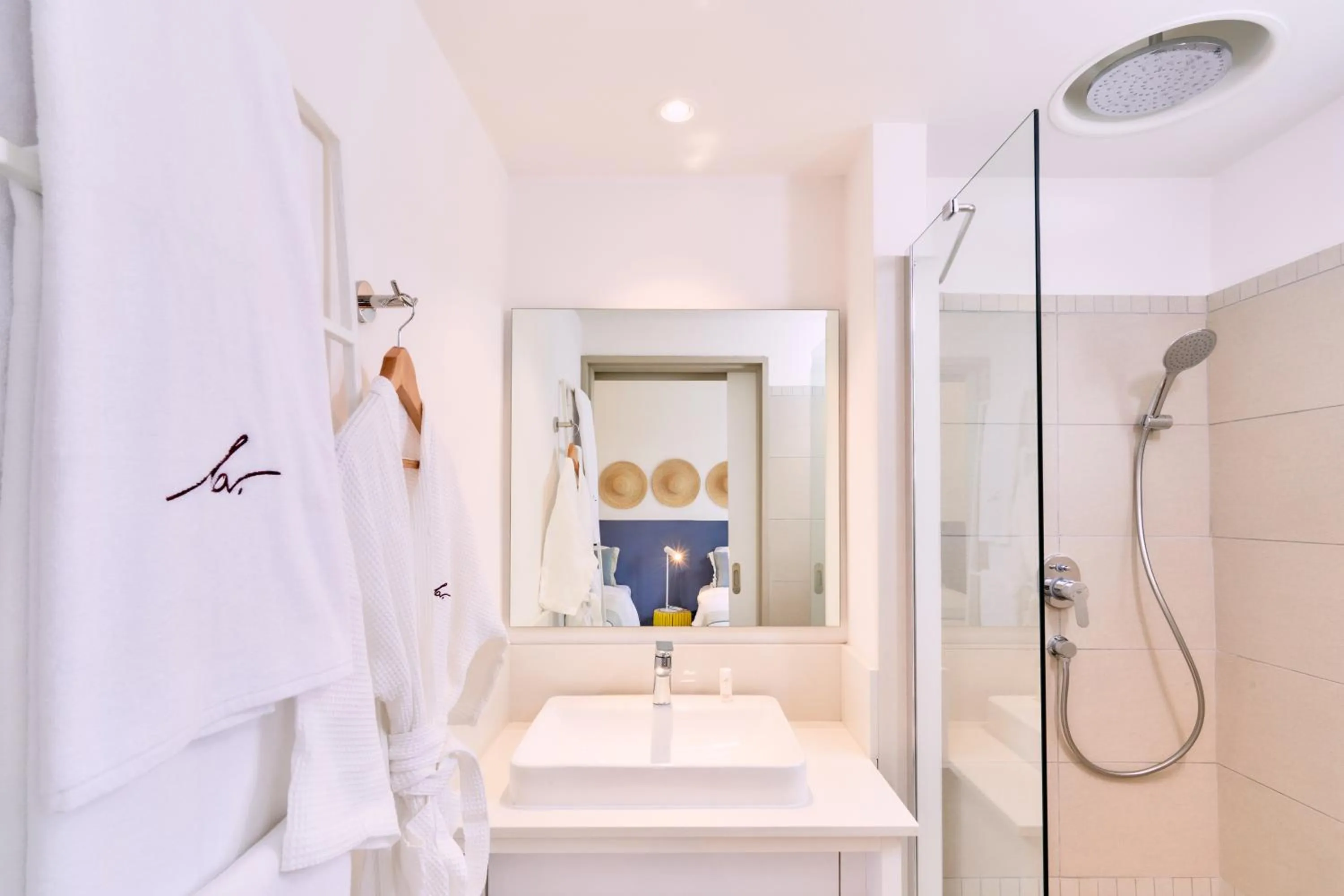 Shower in Les Estivales Beachfront Suites & Penthouses by LOV Mauritius