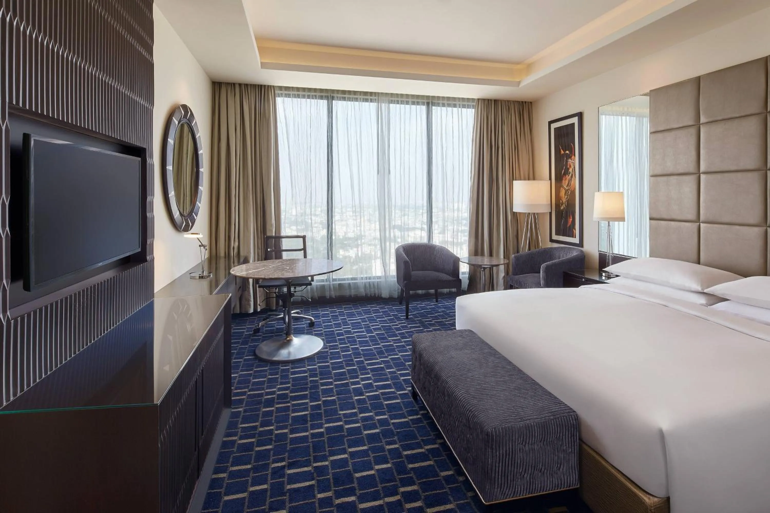 Photo of the whole room, Bed in Renaissance Bengaluru Race Course Hotel