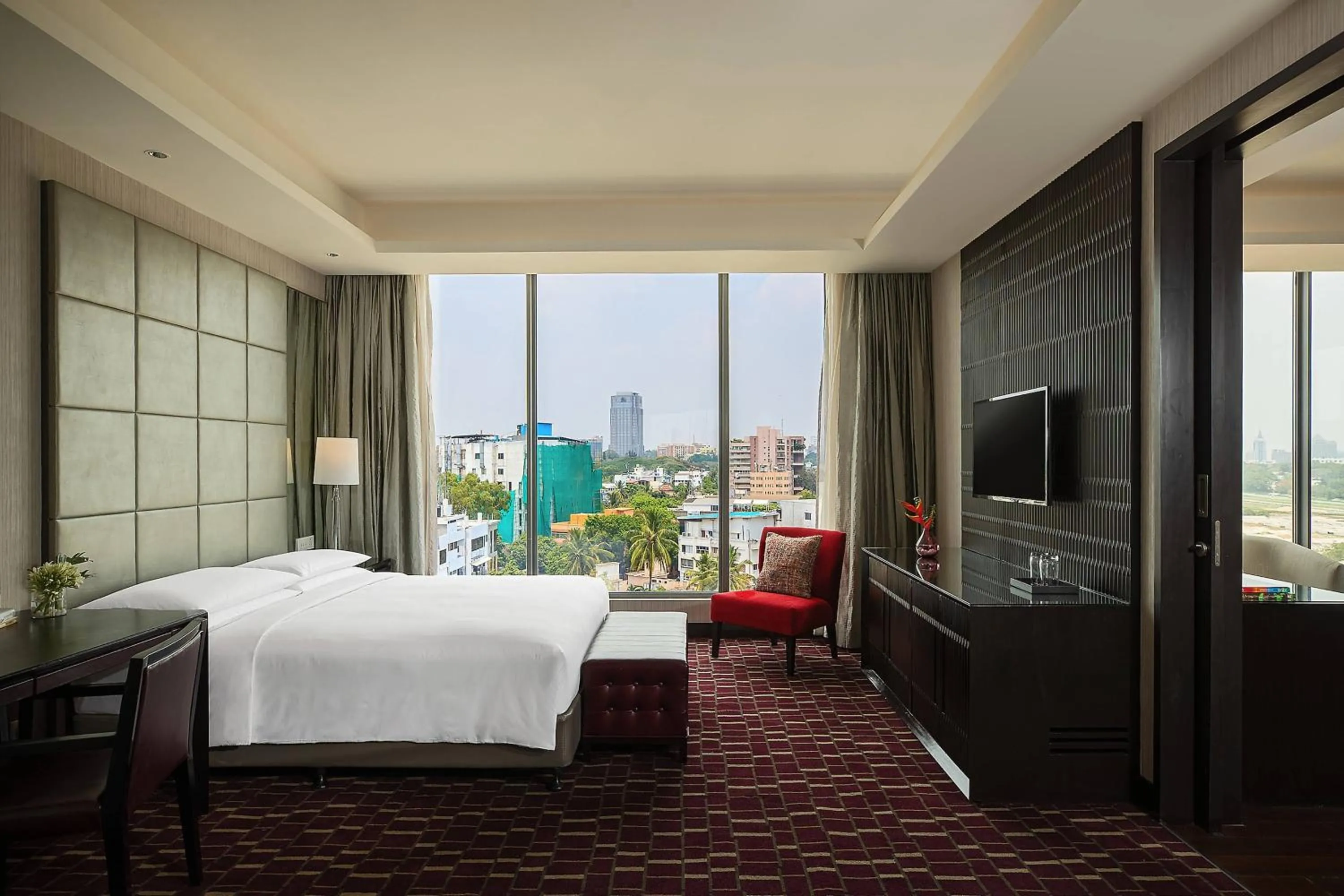 Lounge or bar, Bed in Renaissance Bengaluru Race Course Hotel