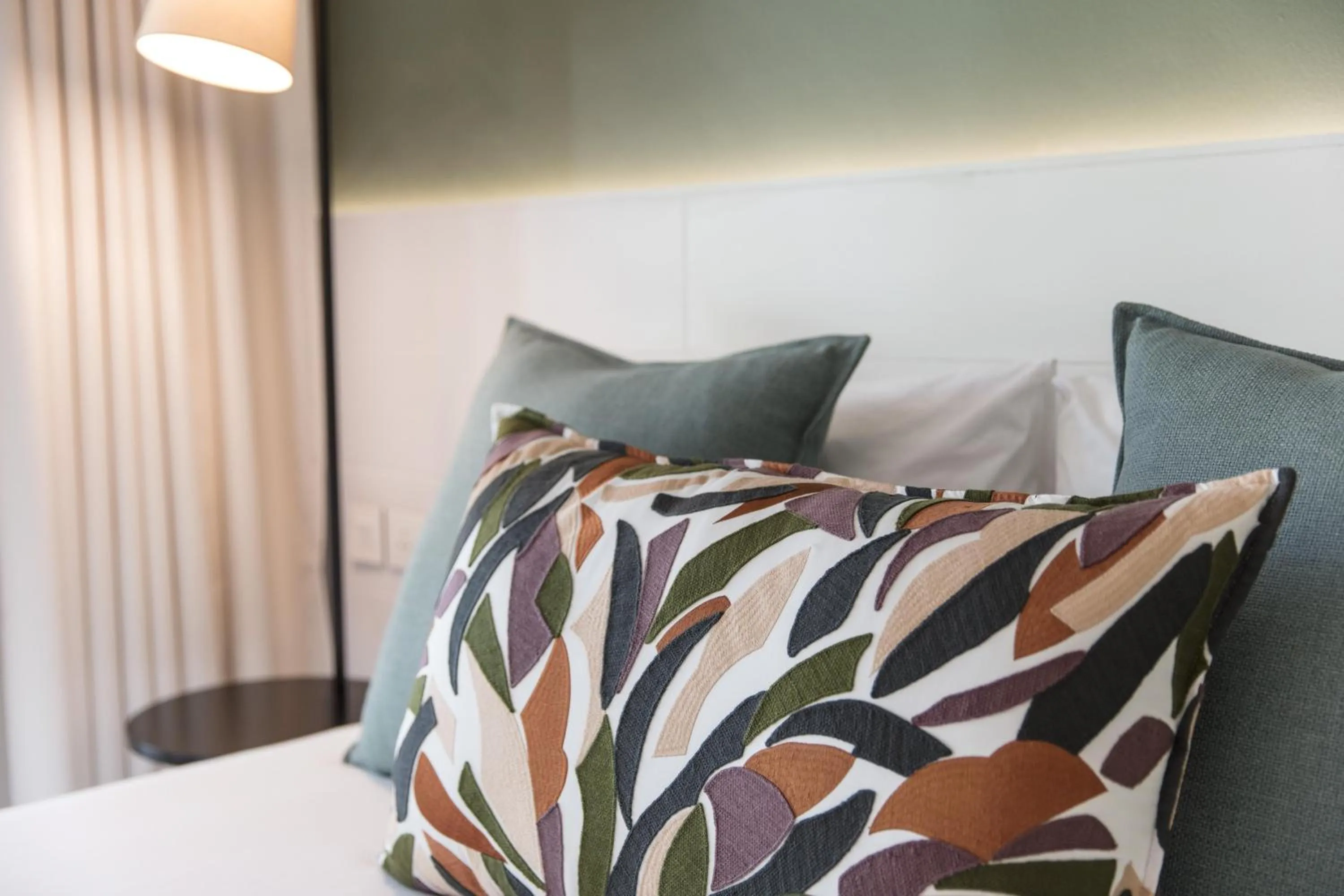 Bed in Victoria Beachcomber Resort & Spa