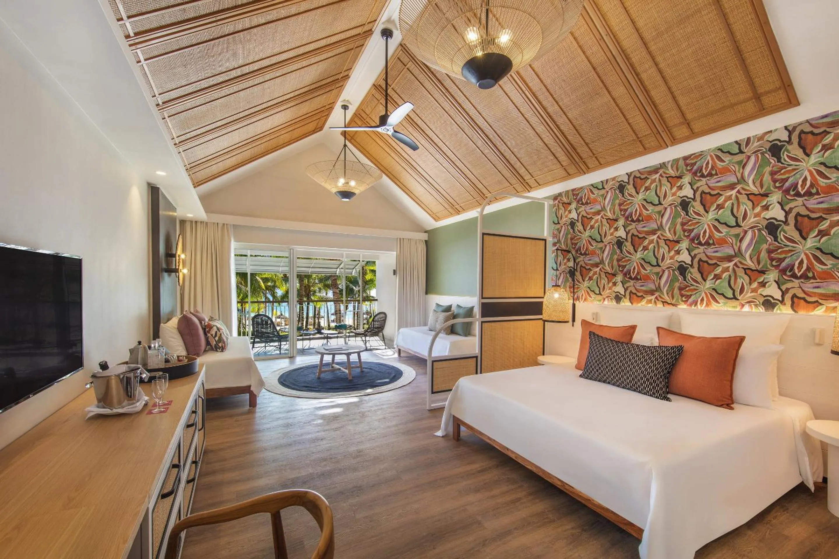 Bed in Victoria Beachcomber Resort & Spa